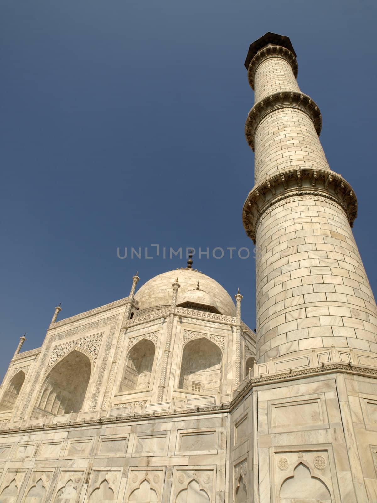 Beautiful white marble of Taj Mahal and minaret