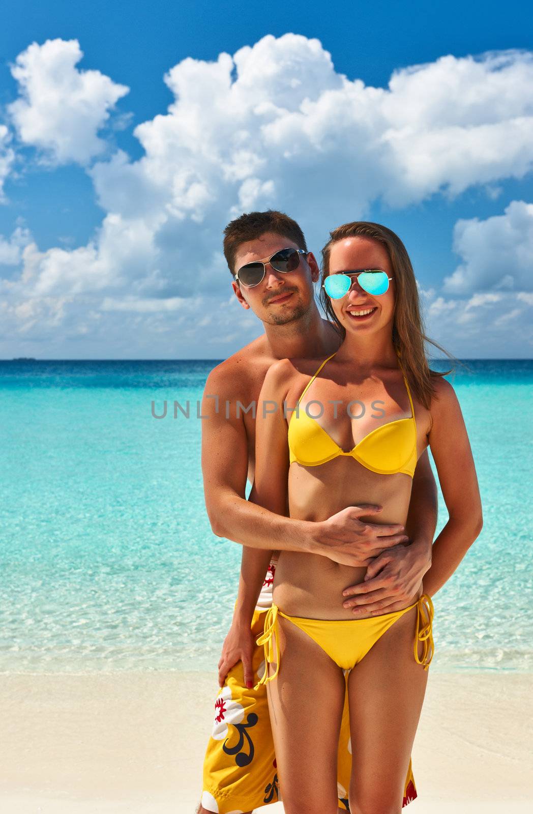 Couple on a tropical beach at Maldives