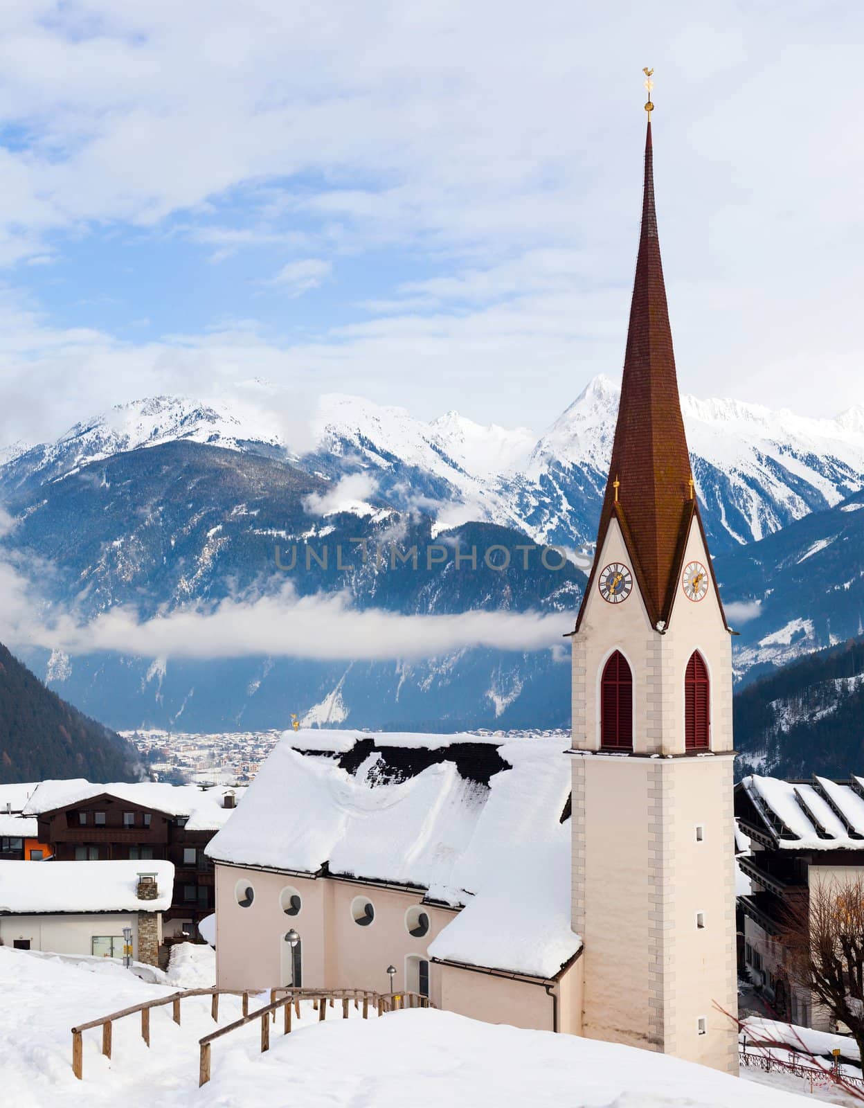 Winter idyllic with church in the austrian alps