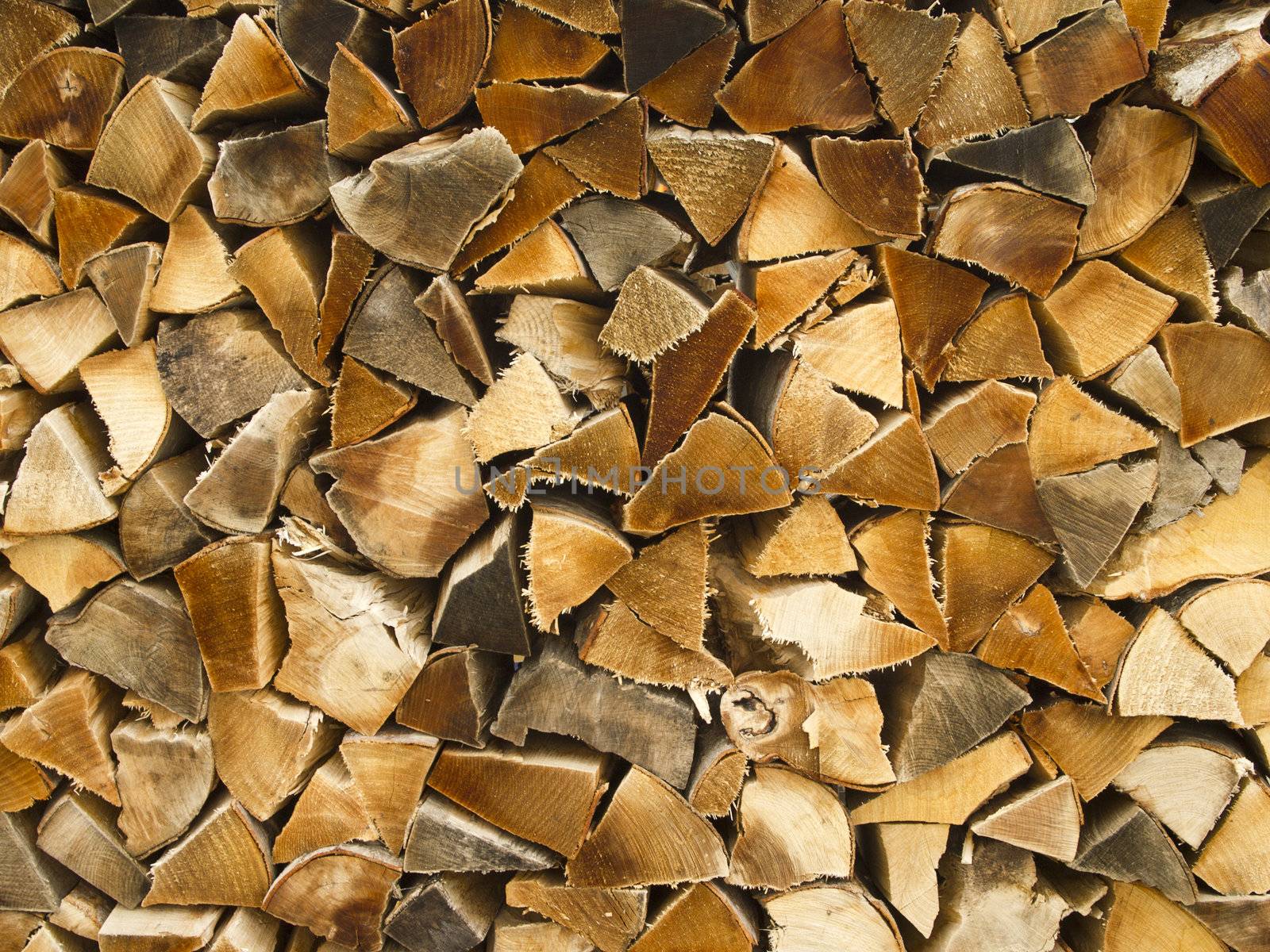 Stack logs of dry chopped firewood