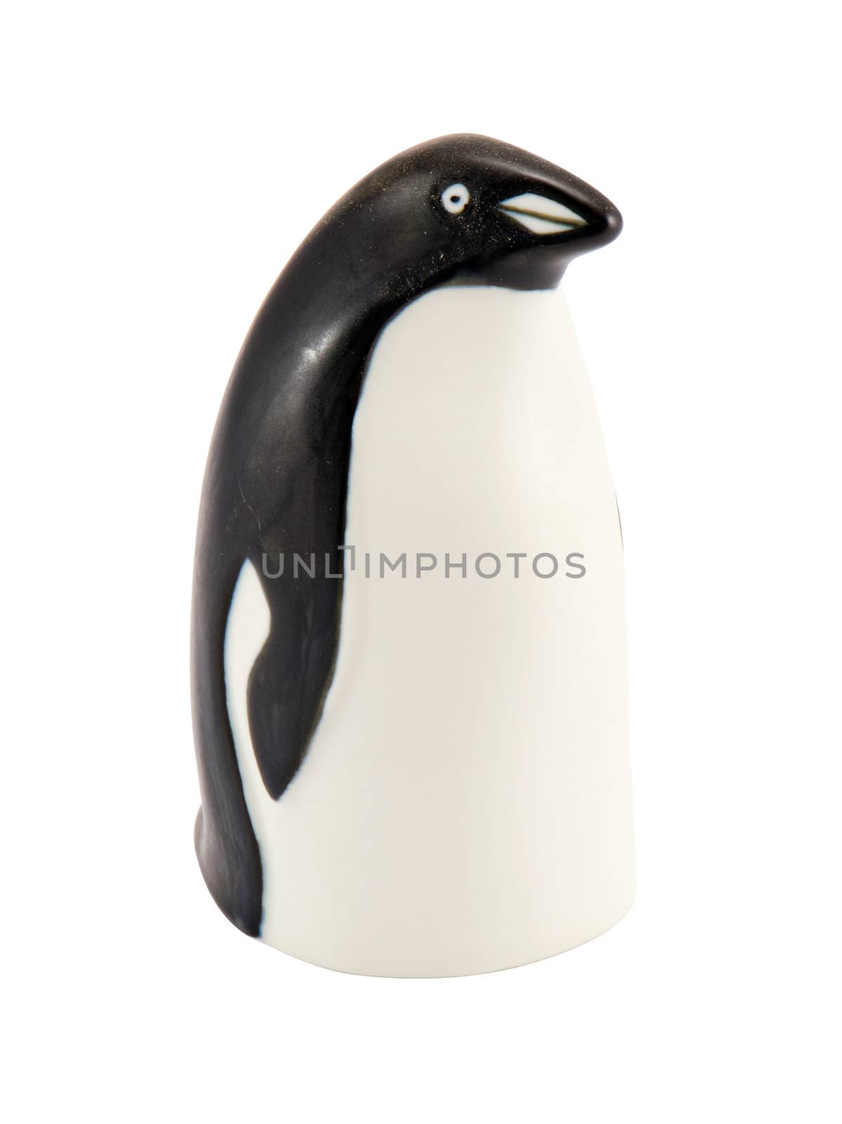 Penguin figurine isolated on a white background. Home decoration.