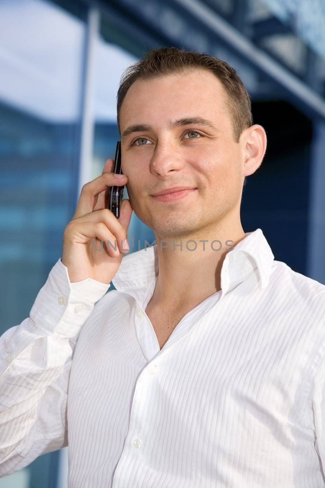 picture of handsome businessman with cell phone