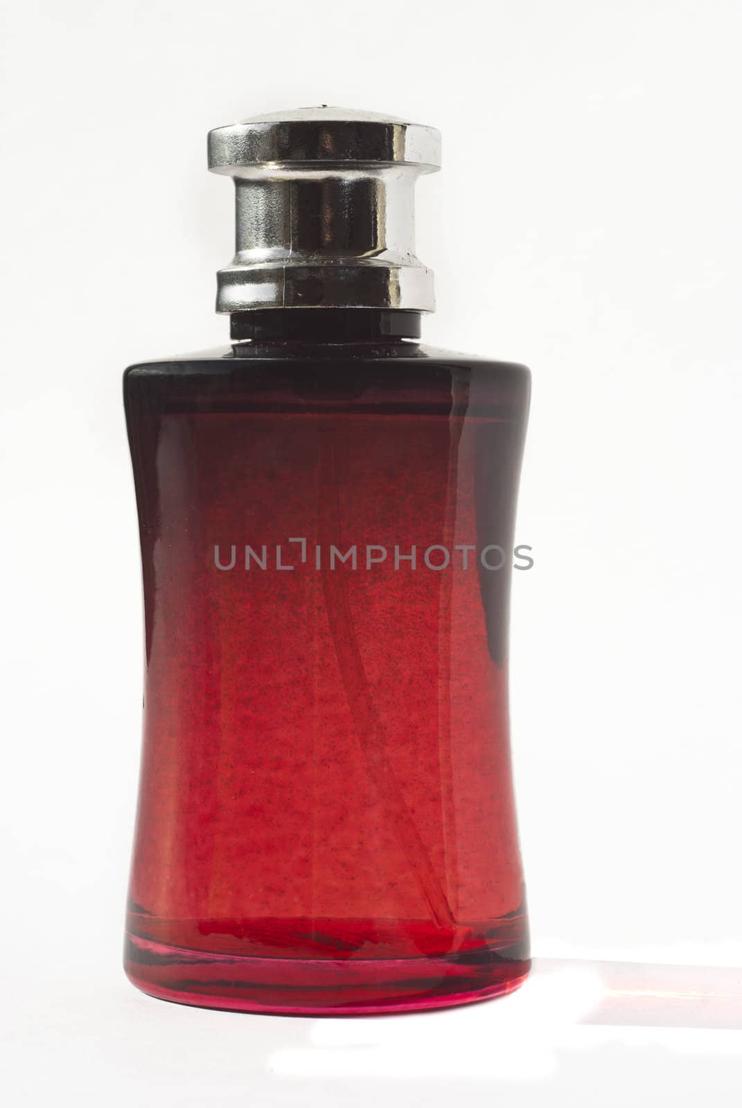 perfume in red bottle by gandolfocannatella