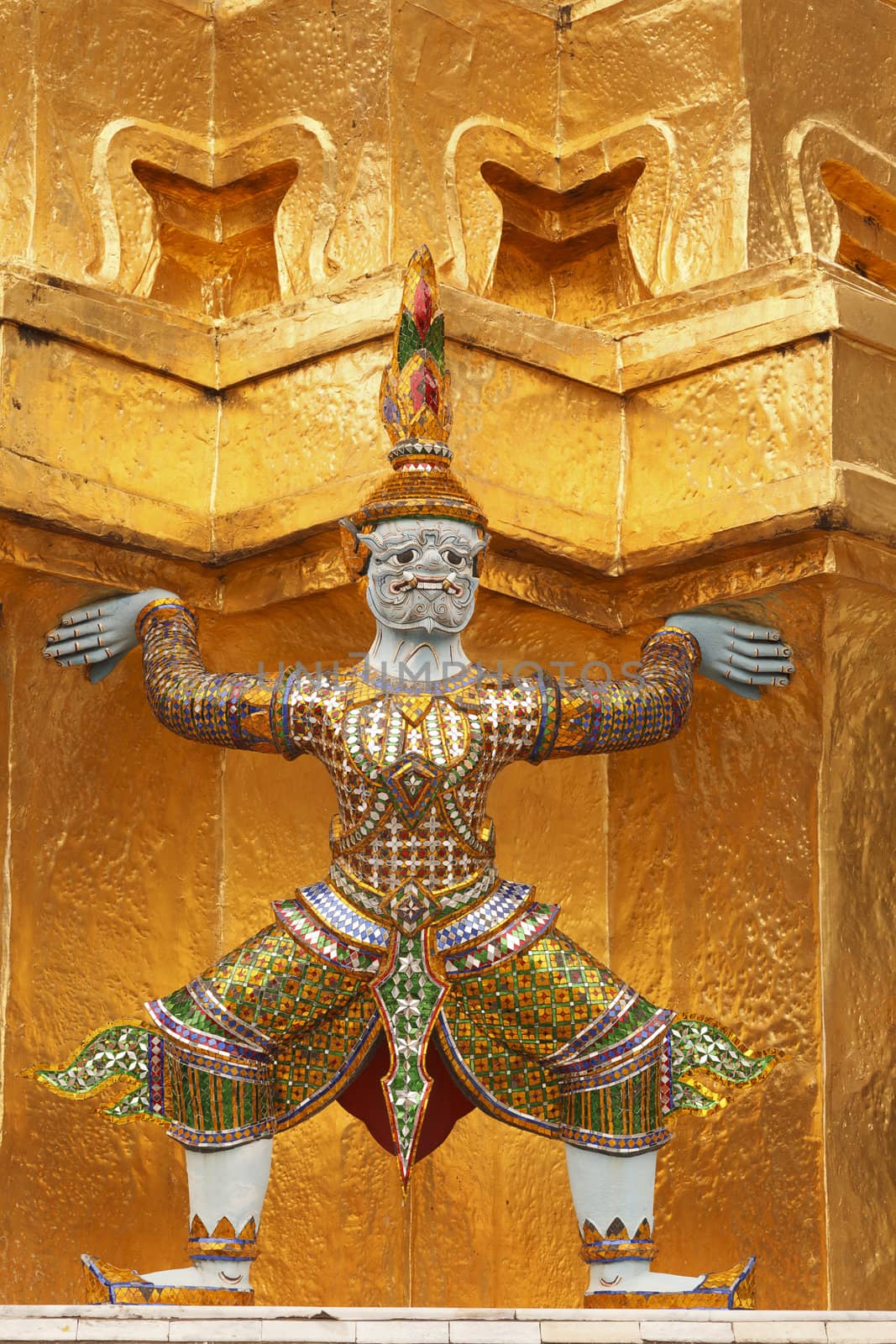 Tired Giant carry some part of golden pagoda in Thailand on its back 