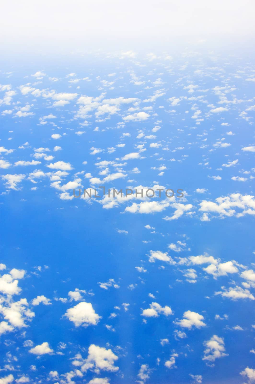 view from above of cloud and ocean
