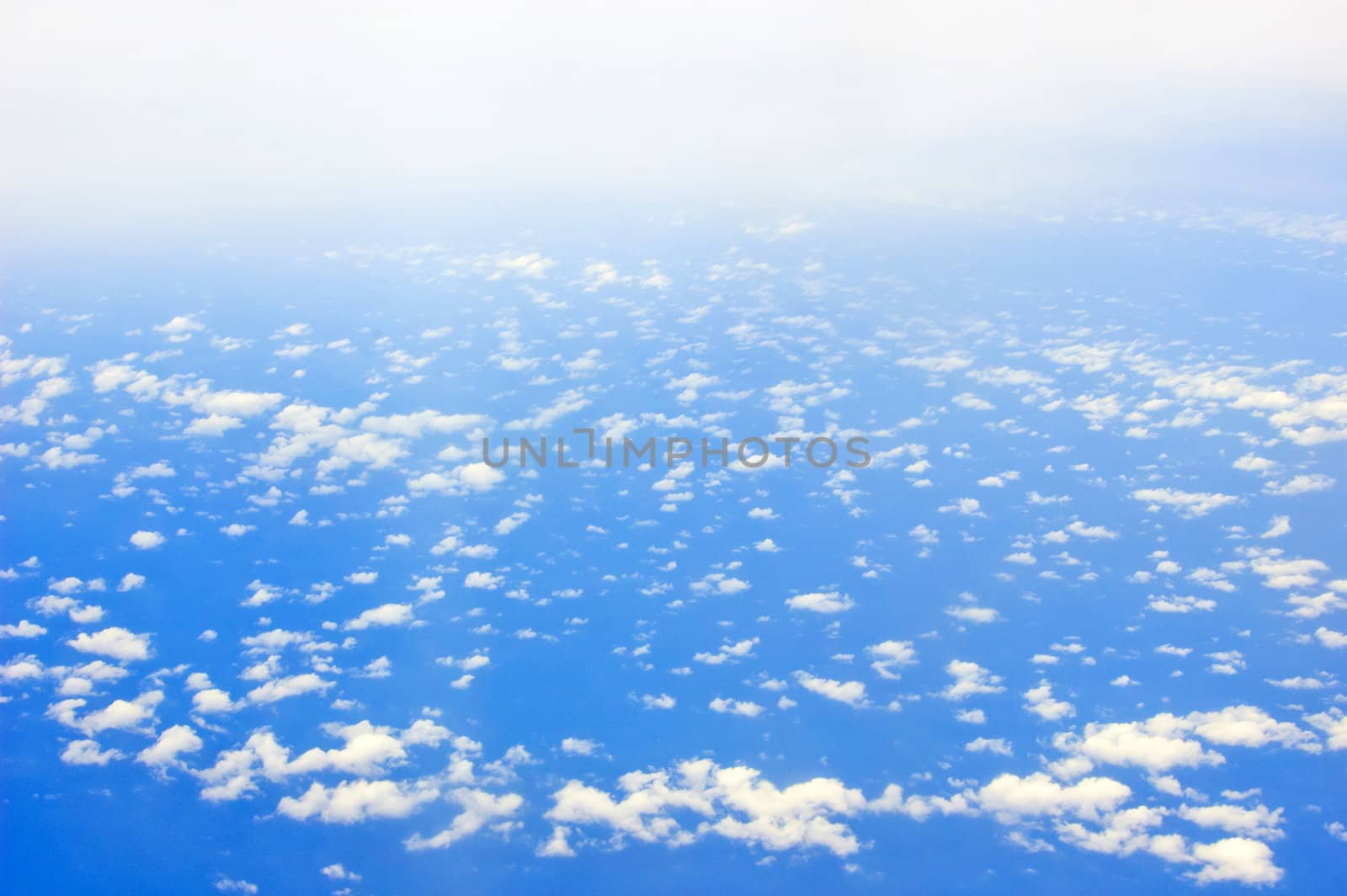 view from above of cloud and ocean