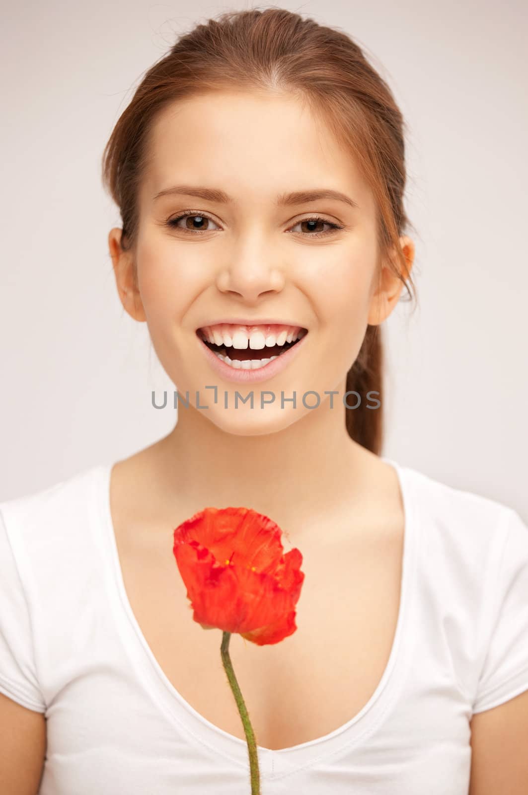 picture of beautiful woman with red flower