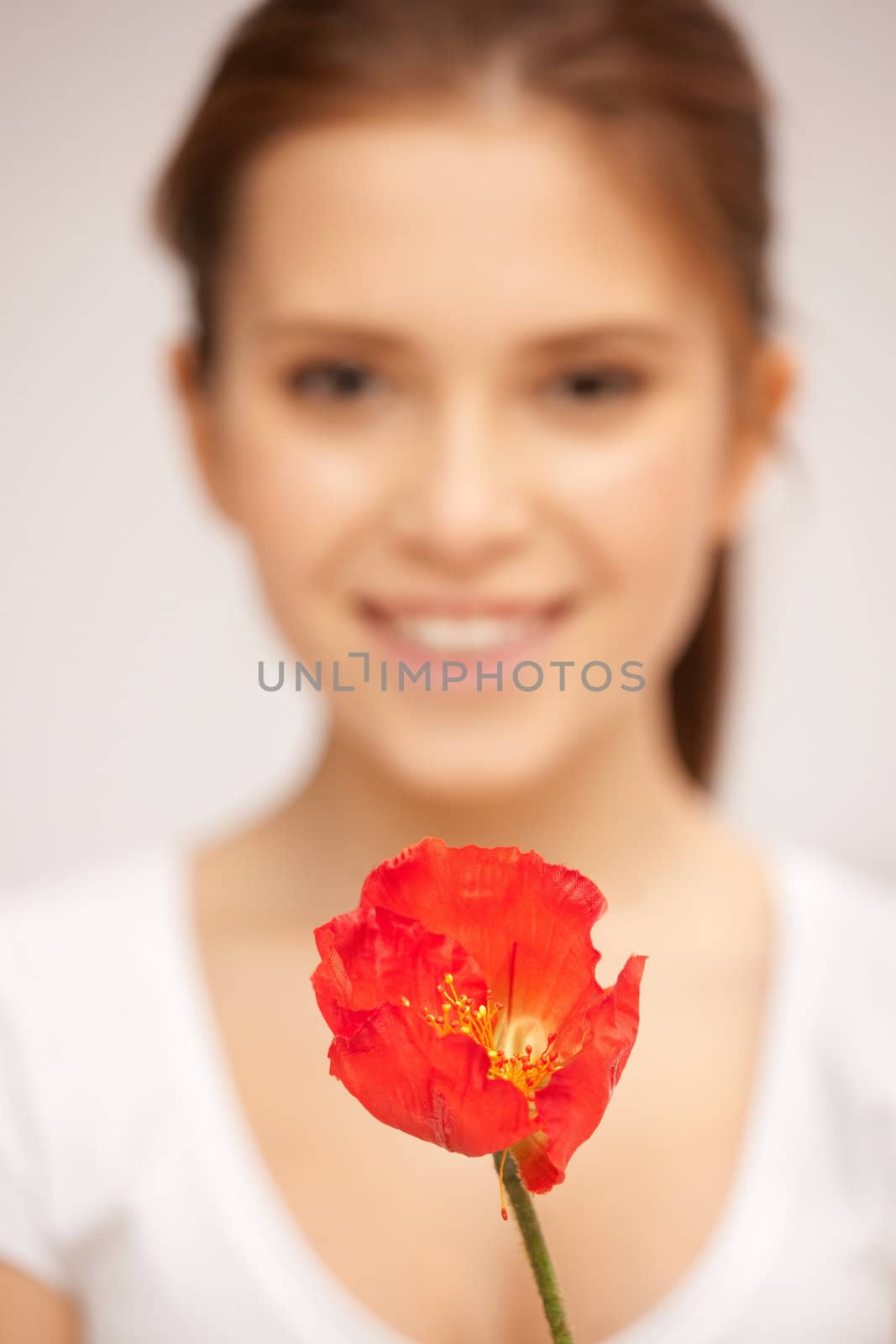 beautiful woman with red flower by dolgachov