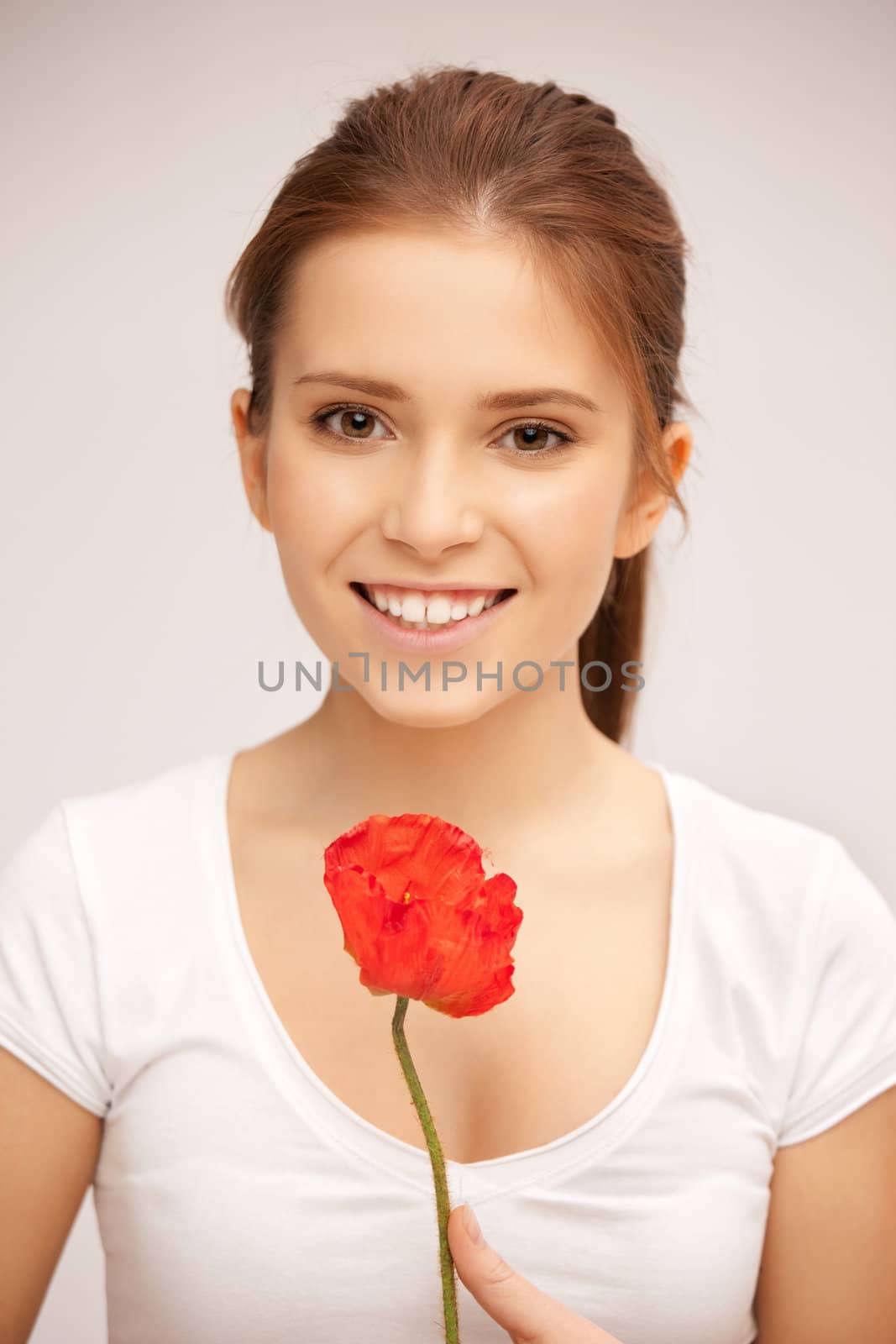 picture of beautiful woman with red flower