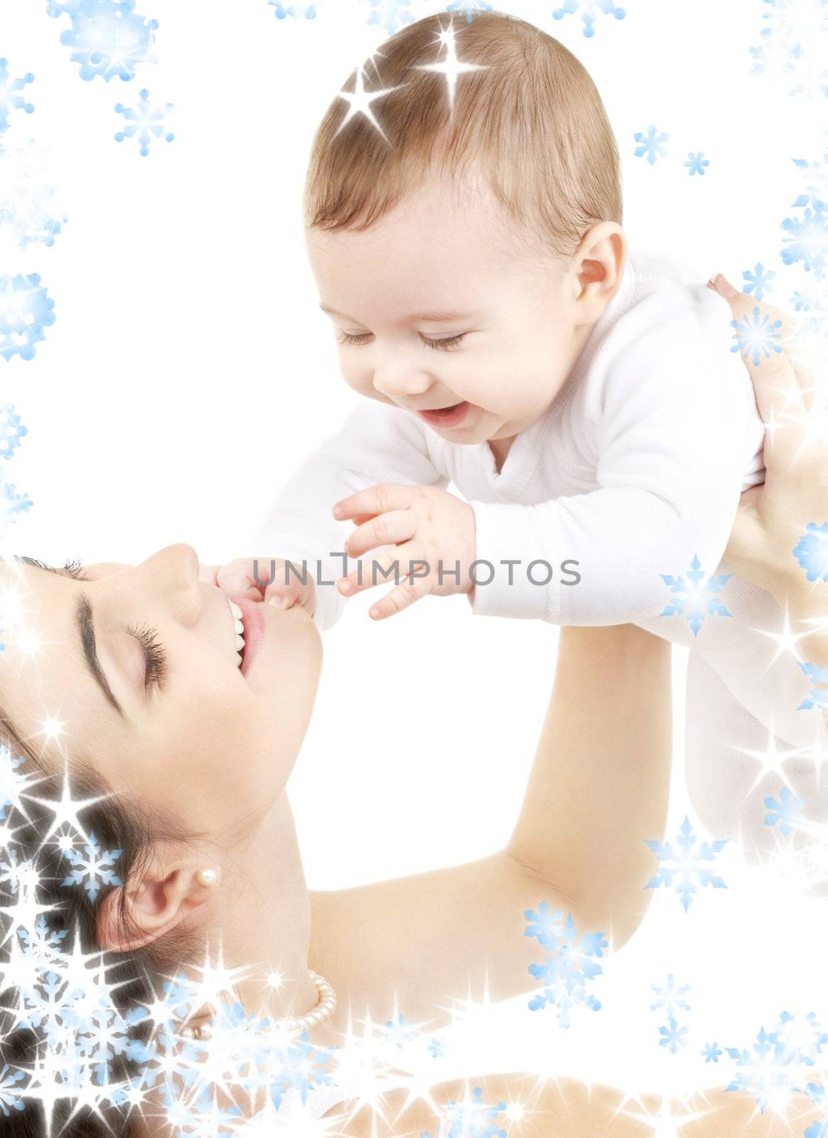 picture of happy mother with baby and snowflakes