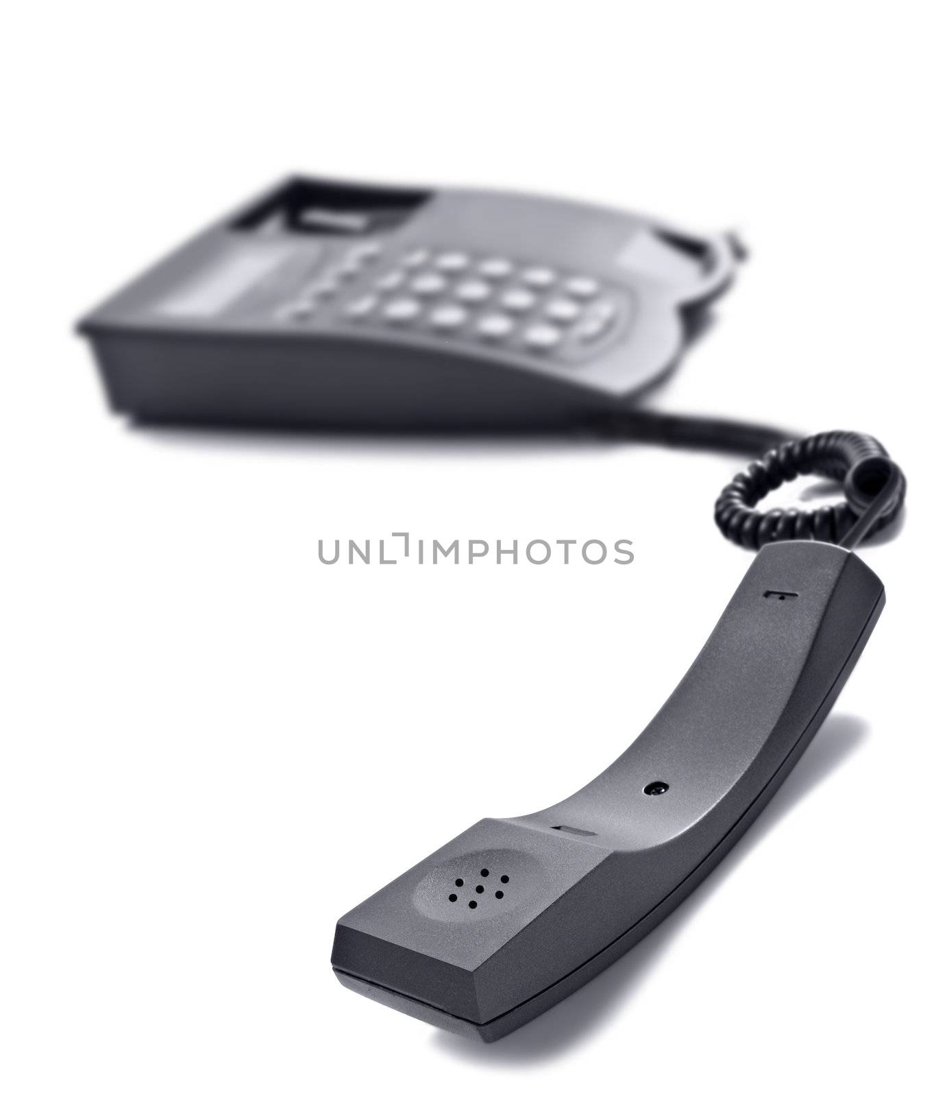 Black telephone on white with space for text by tish1