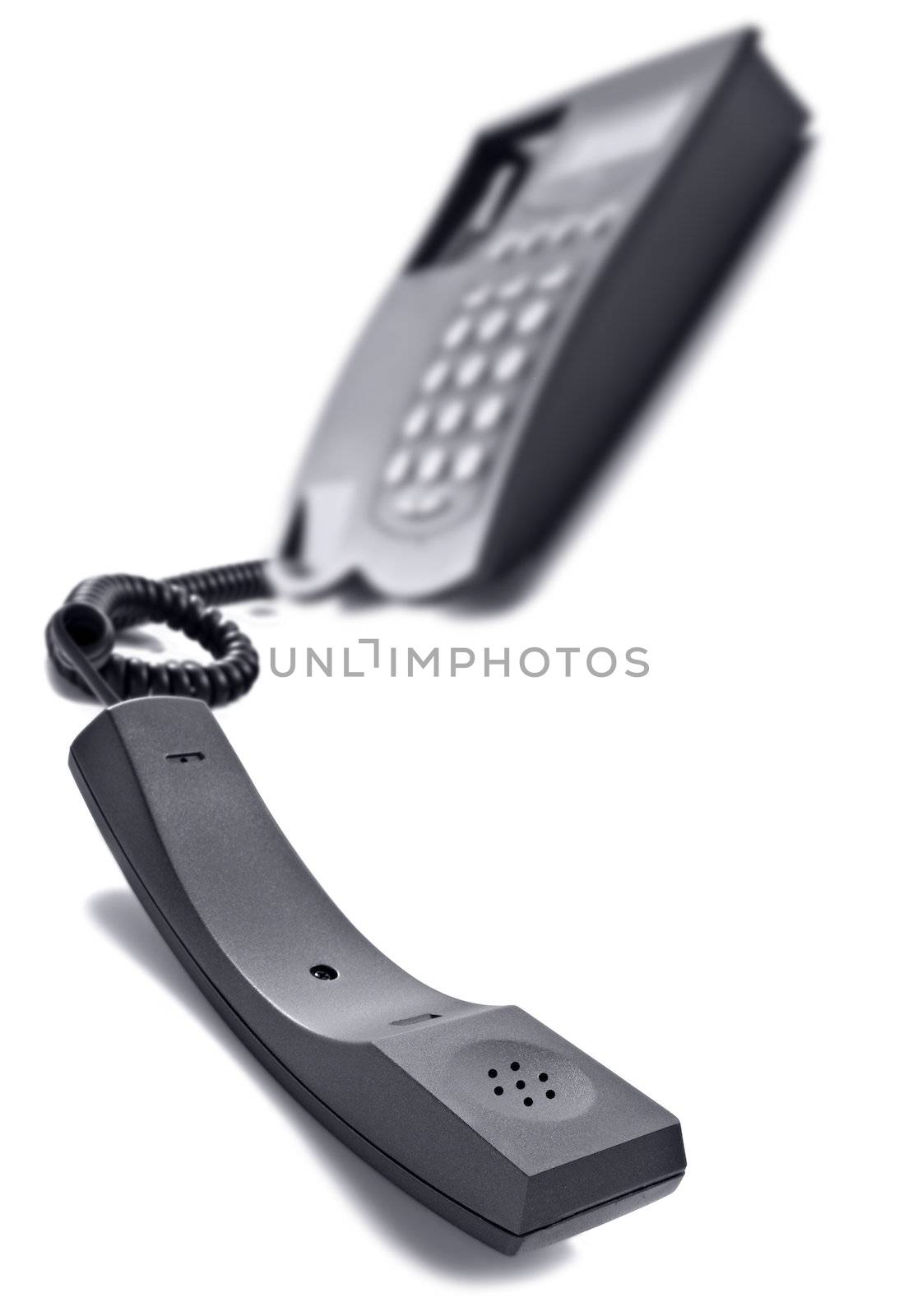 Black telephone on white with space for text by tish1