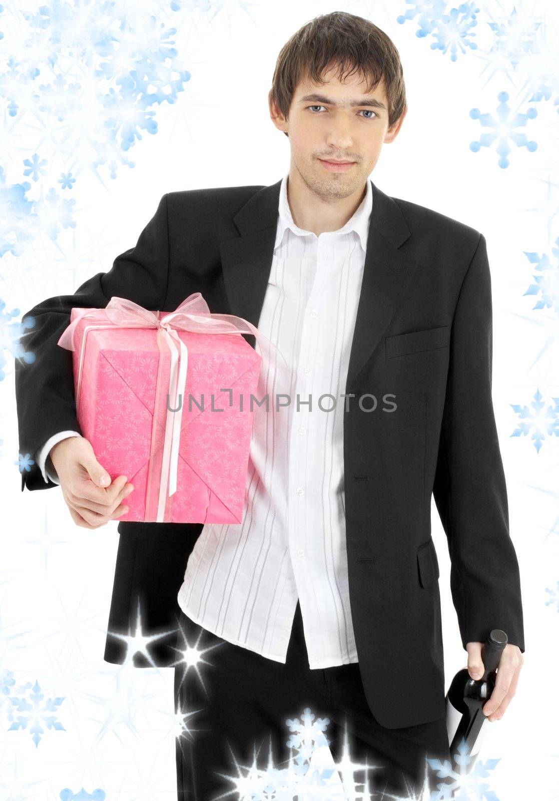 handsome man with pink wrapped gift and bottle of wine