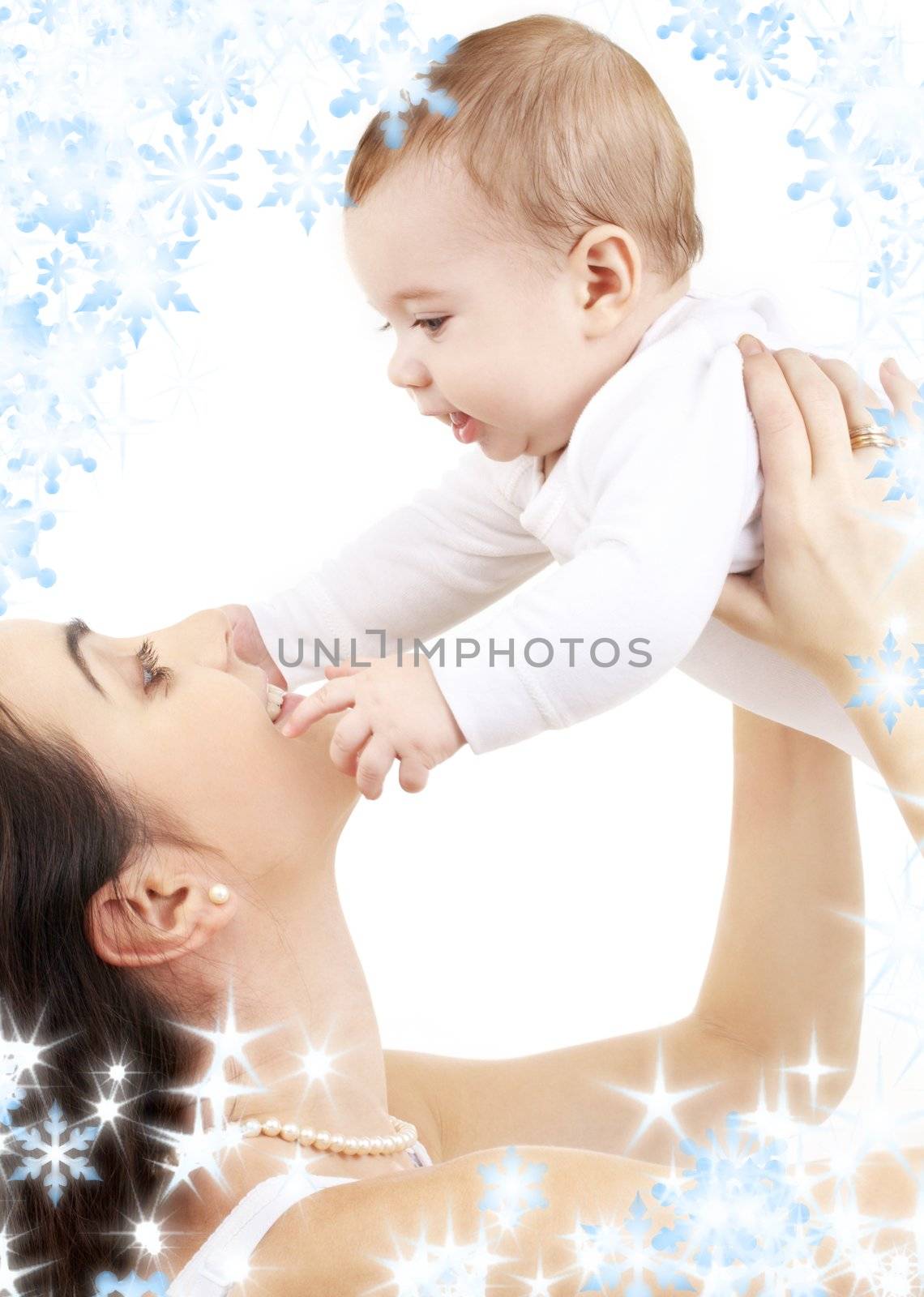 picture of happy mother with baby and snowflakes