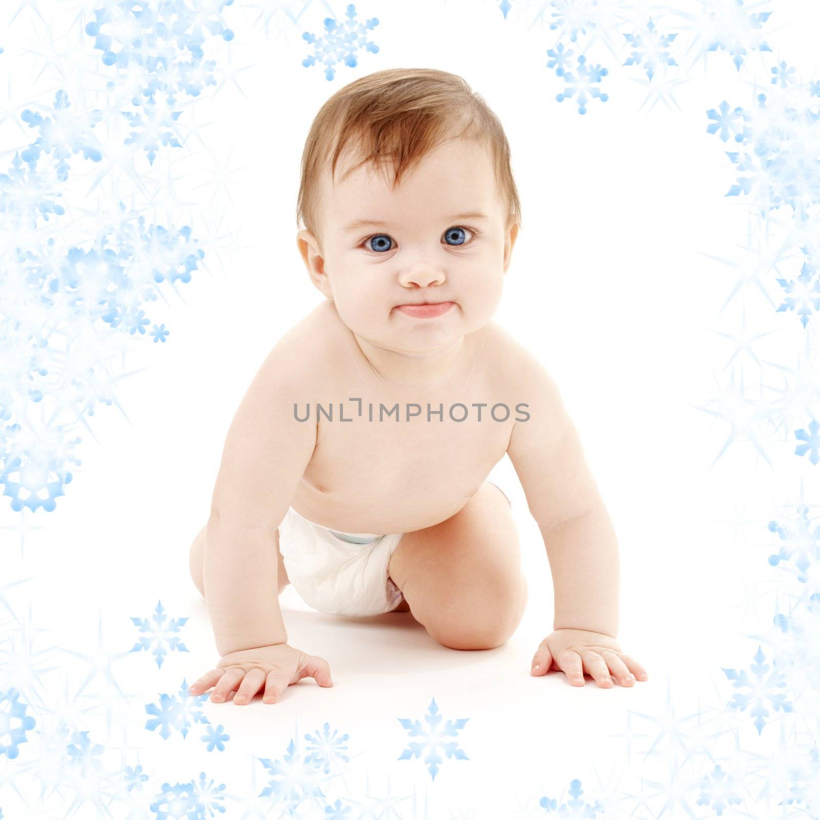 picture of crawling baby boy in diaper with snowflakes