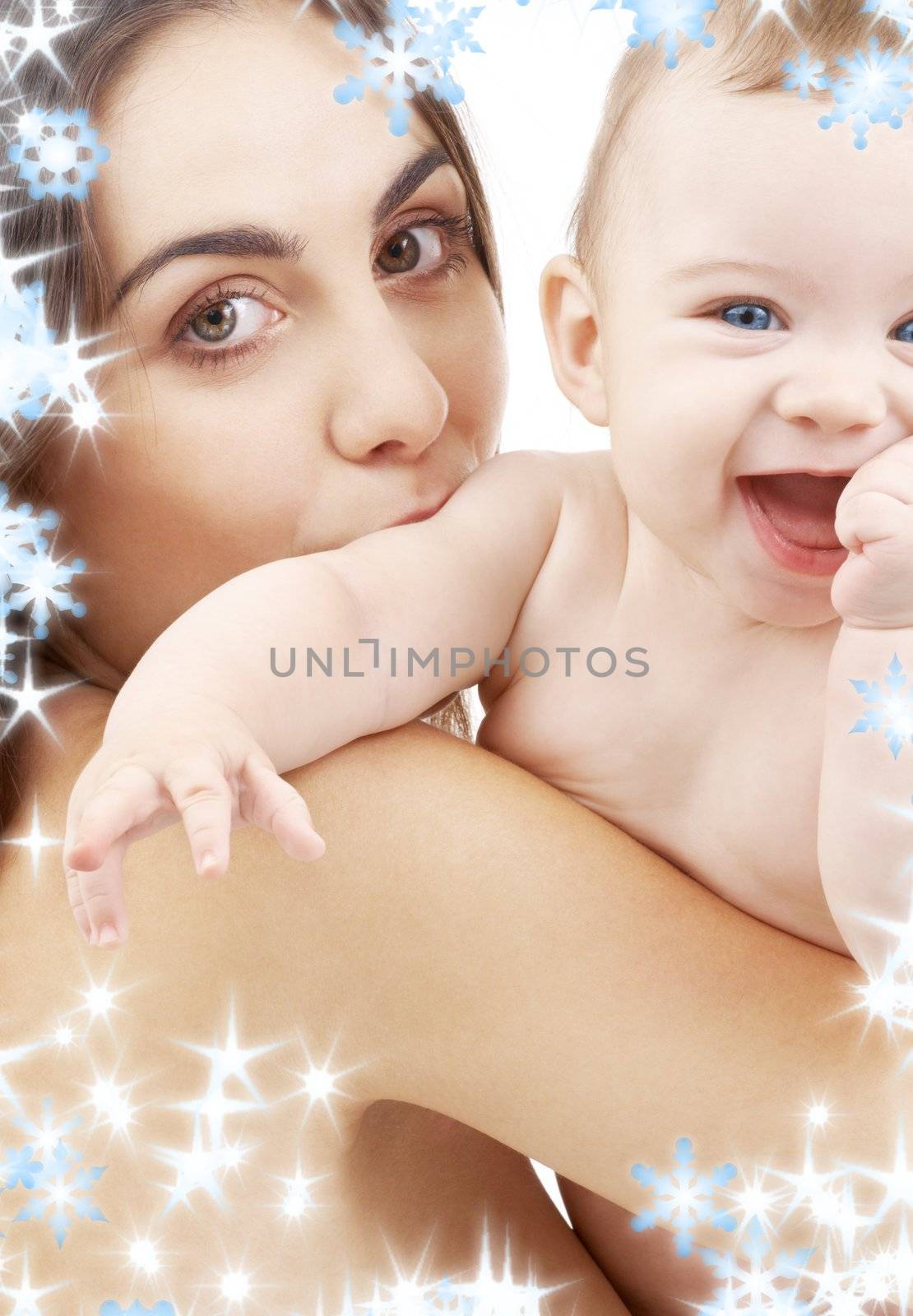 picture of happy mother with baby and snowflakes