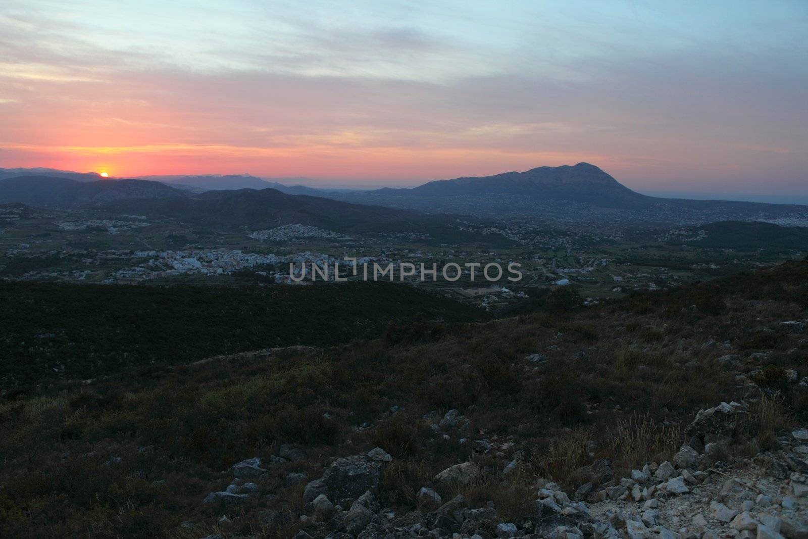 Summer landscape in mountains with the sun