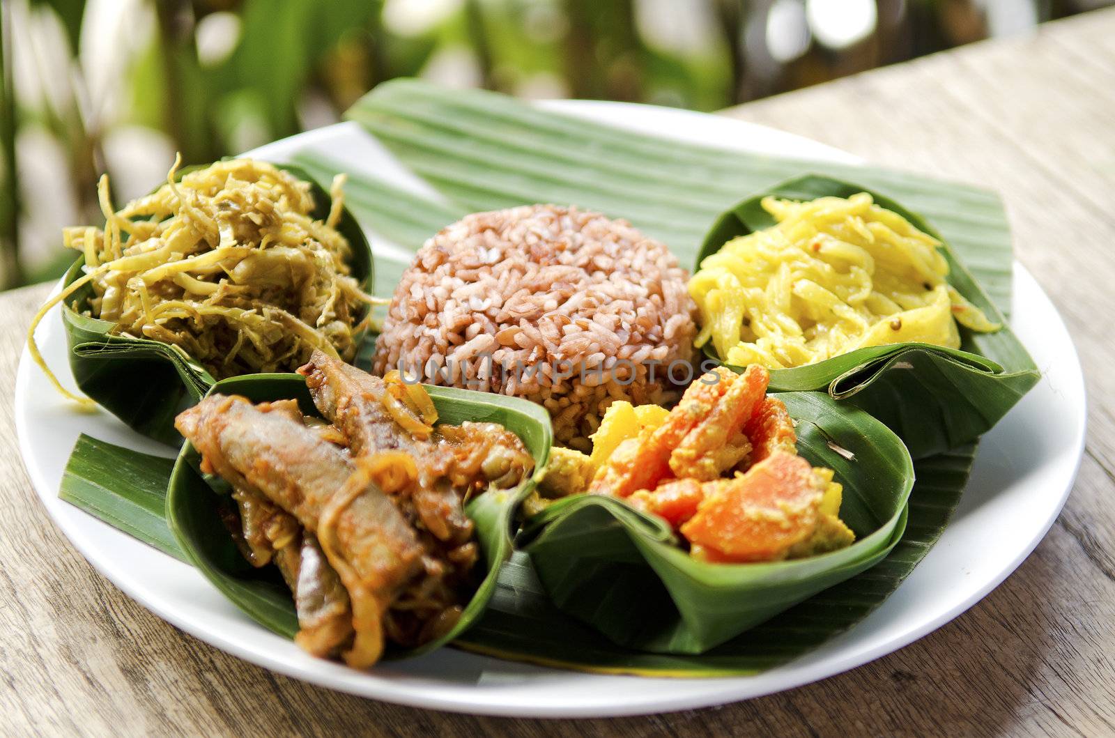 indonesian food in bali, several curries and rice