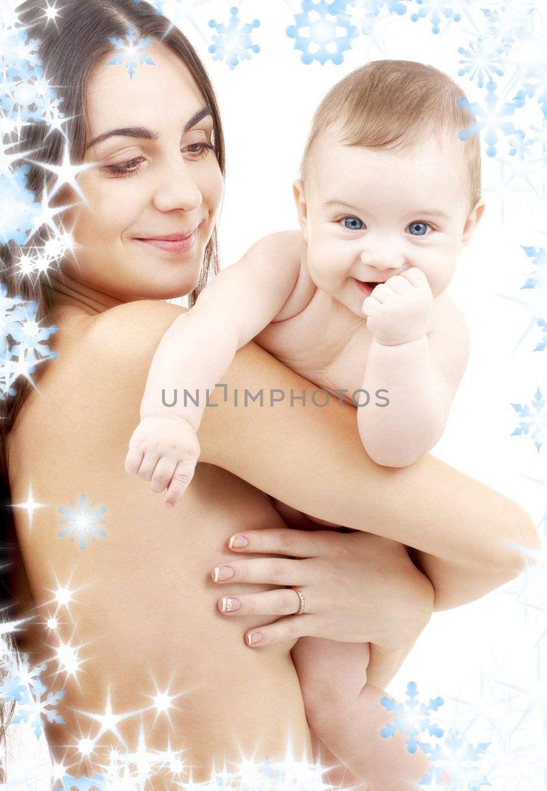 picture of happy mother with baby and snowflakes