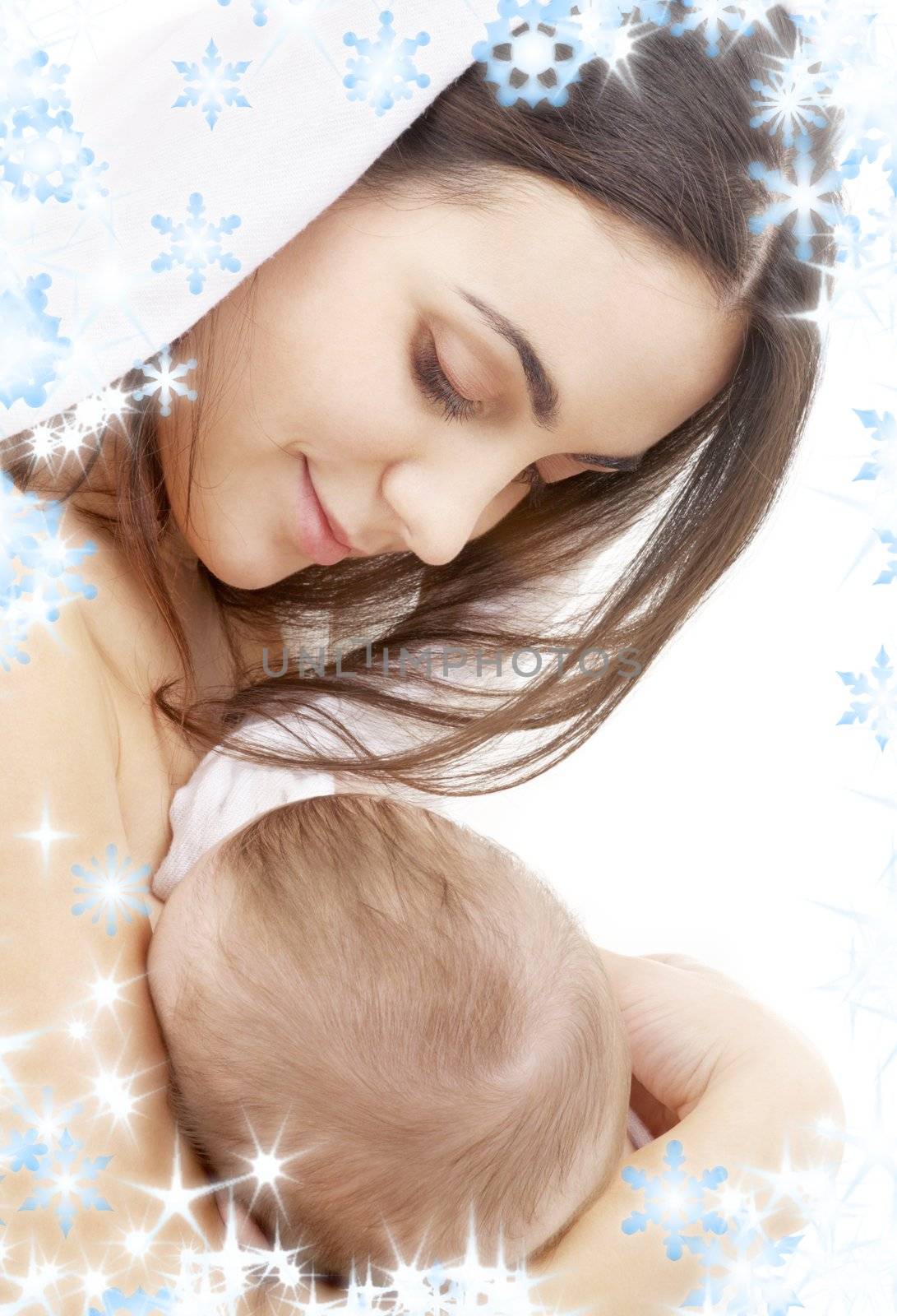 picture of happy mother with baby and snowflakes