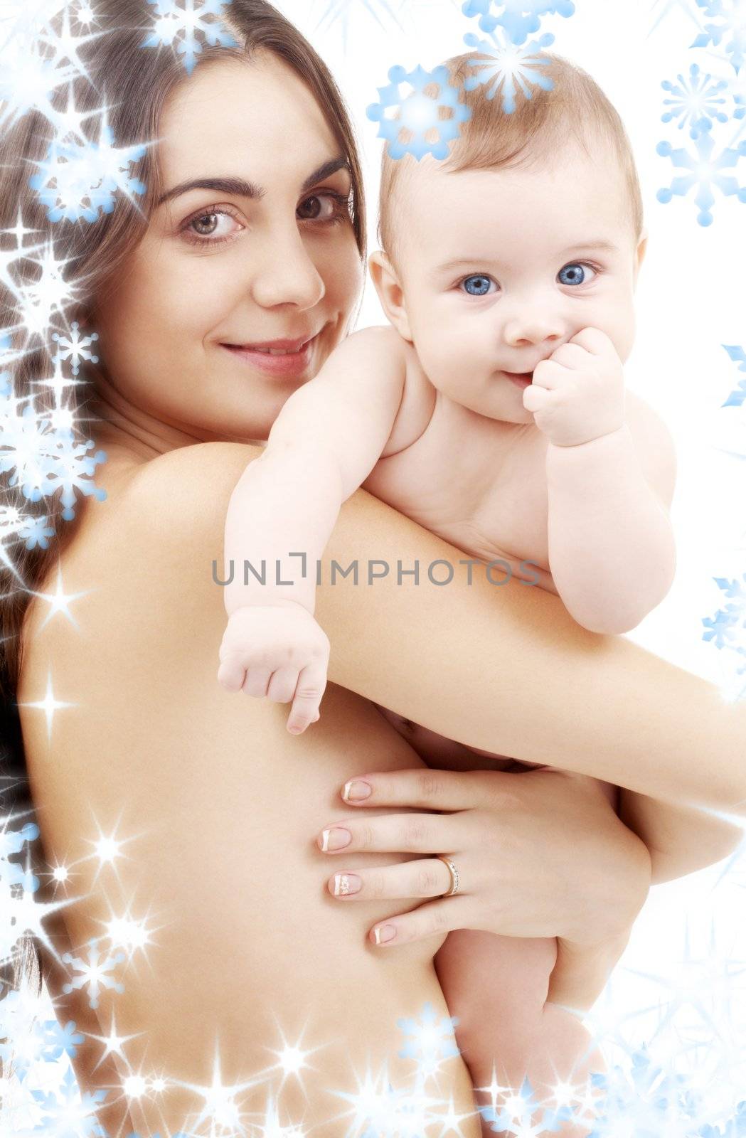 clean baby in mother hands by dolgachov