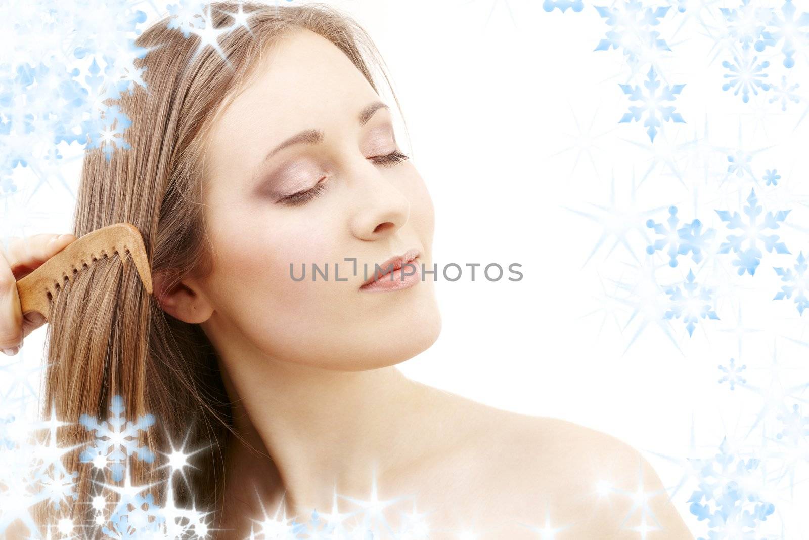 bright picture of combing woman with snowflakes