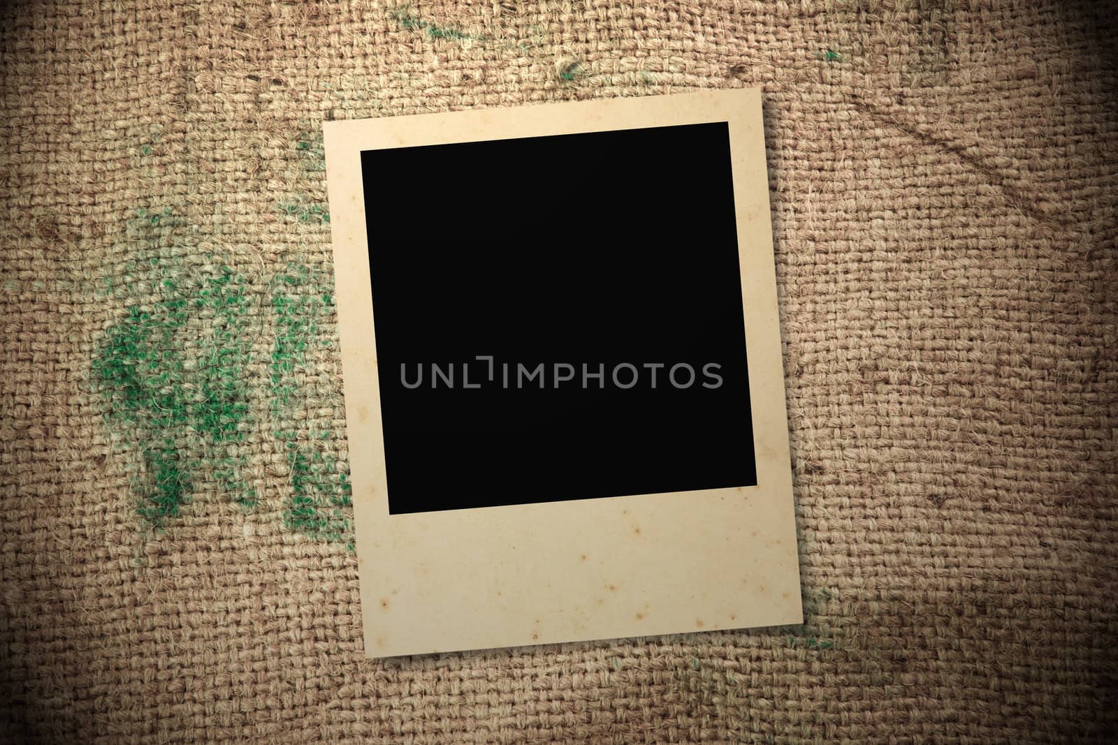 Blank photo frame on Texture sack as background