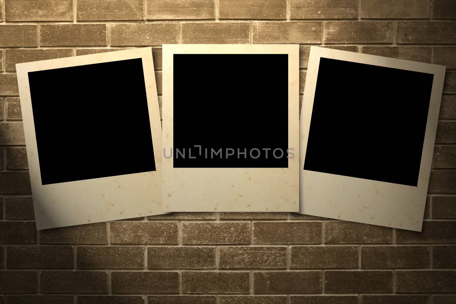Blank photos frames on grey brick old wall as the background