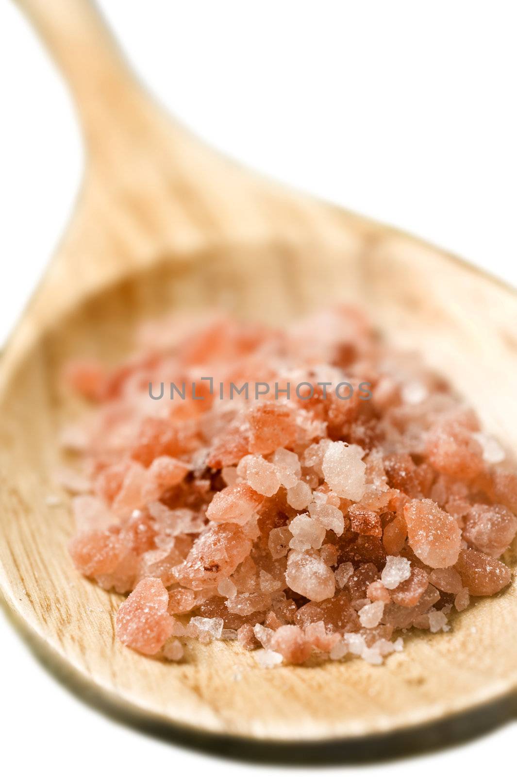 Pure himalayan salt on a wooden spoon