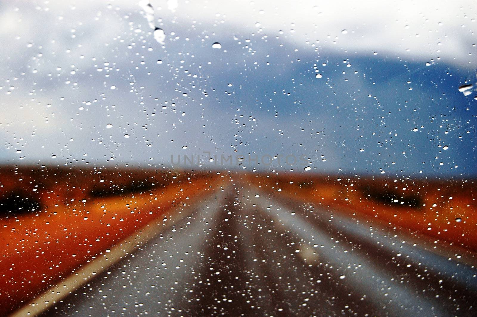 Rain on the road highway somewhere in outback, South Australia