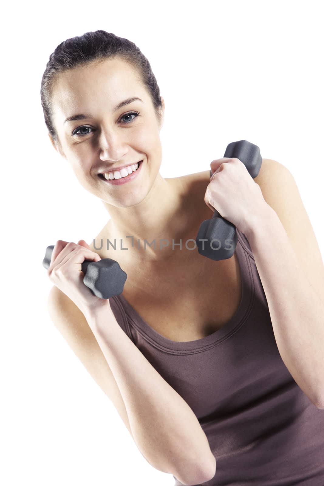 Woman  fitness with dumbbells isolated on white  by stokkete