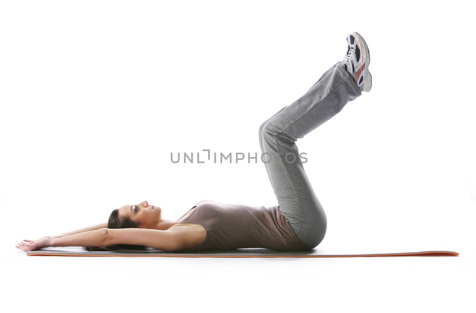 Fitness woman doing fitness exercise on mat . White background