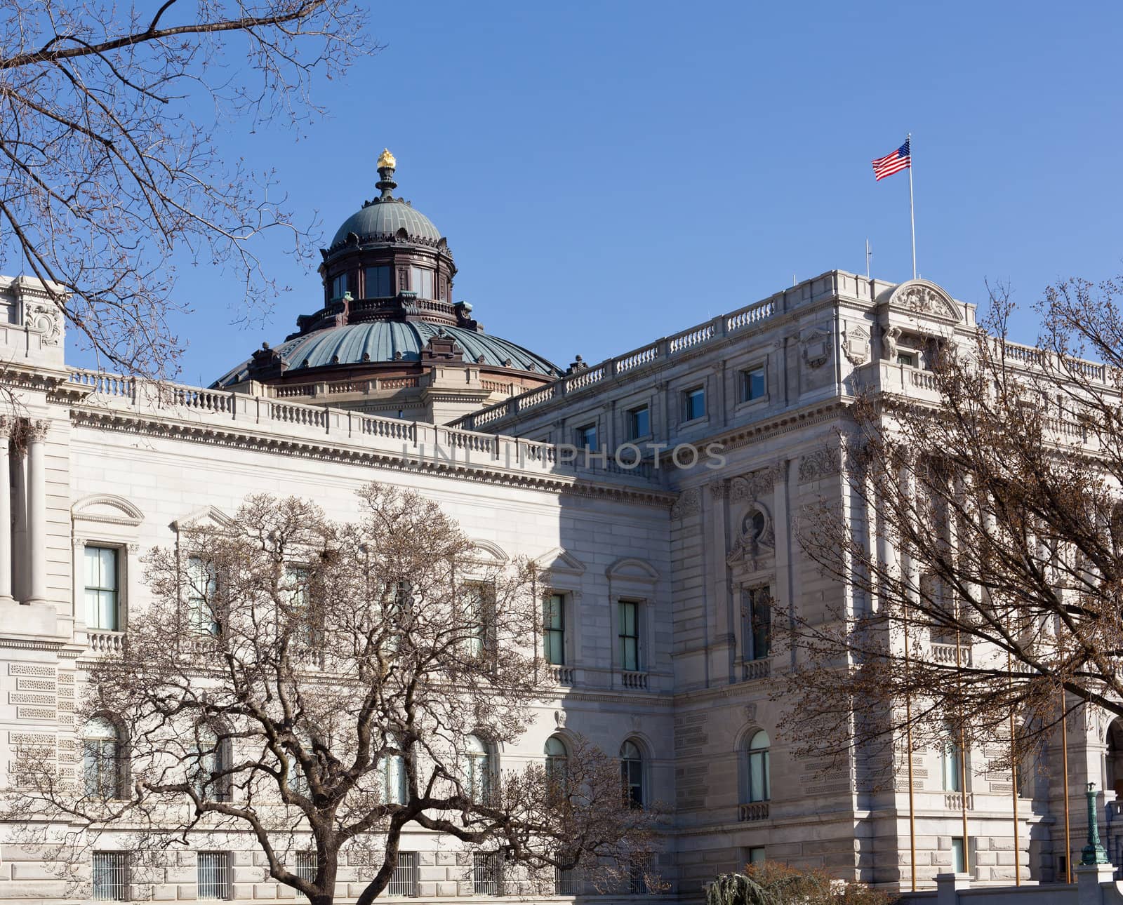 Carved front of Library of Congress Washington DC with dome over reading room