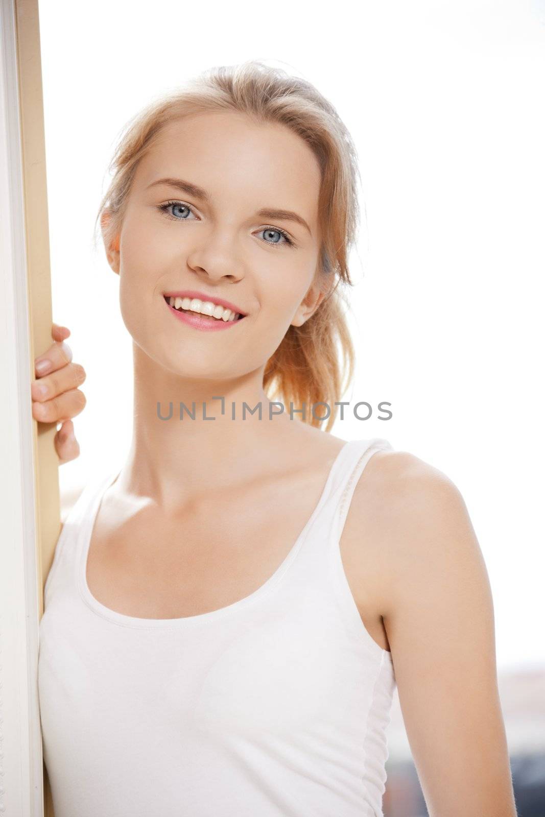 picture of happy and smiling teenage girl outdoors