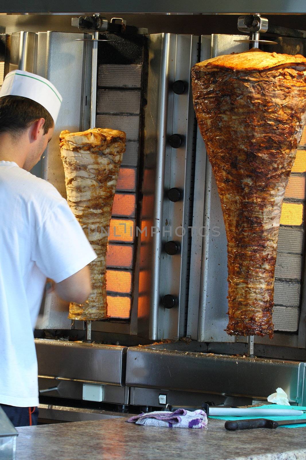 Man making shawarma
