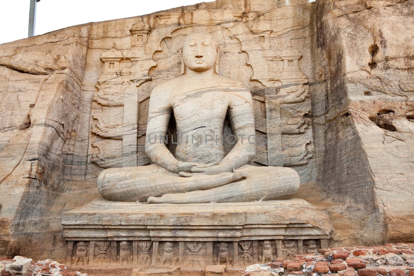ancient seated buddha in gal vihara, polonnaruwa, sri lanka