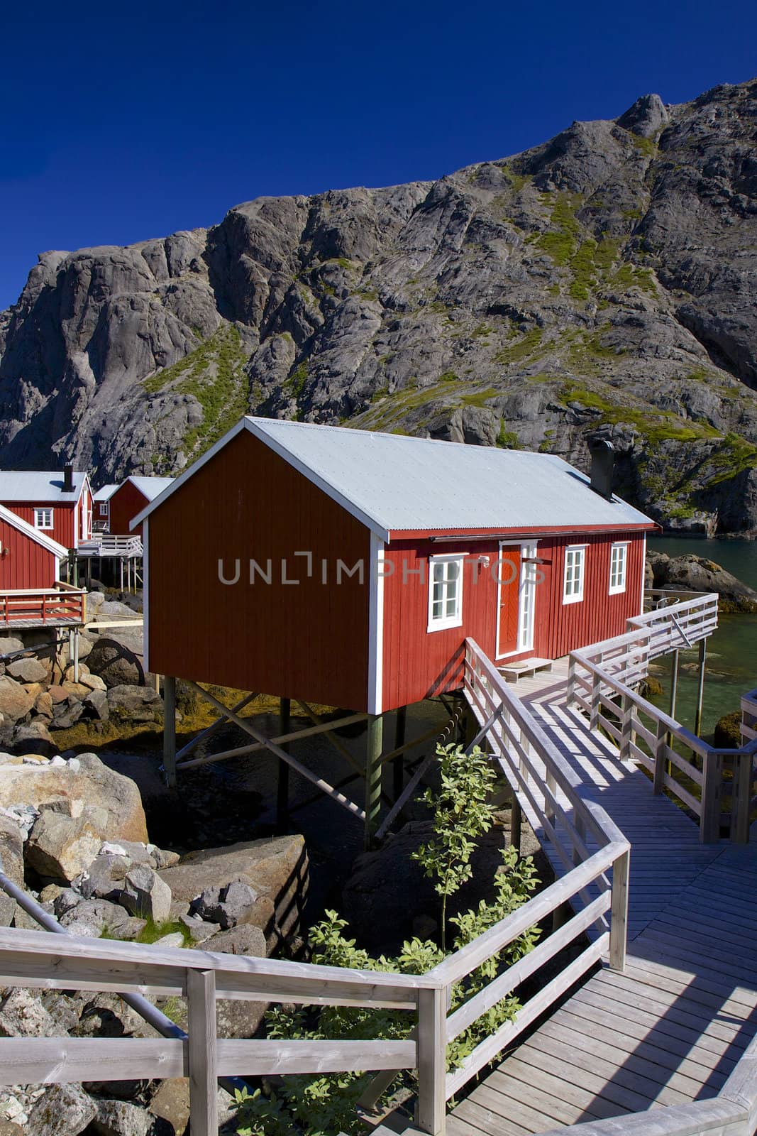 Traditional norwegian fishing hut in village of Nusfjord on Lofoten islands in Norway