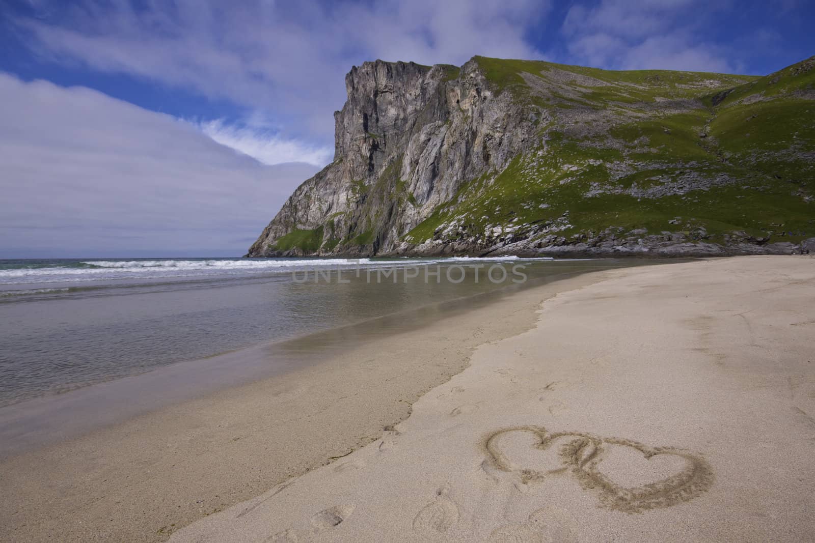 Symbols of love on sandy beach on Lofoten islands in Norway