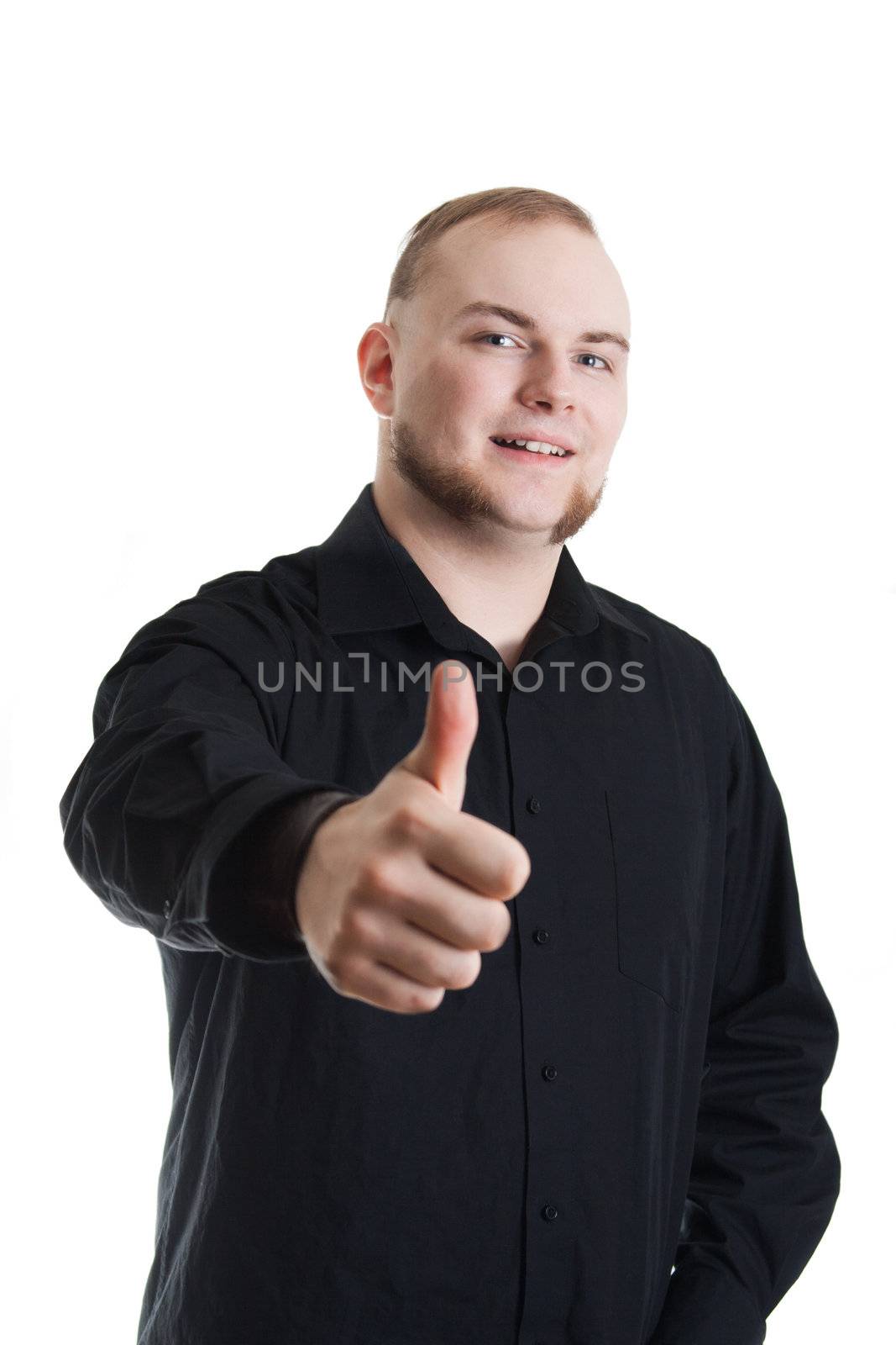 young man with blue eyes gives the thumbs up gesture on white background