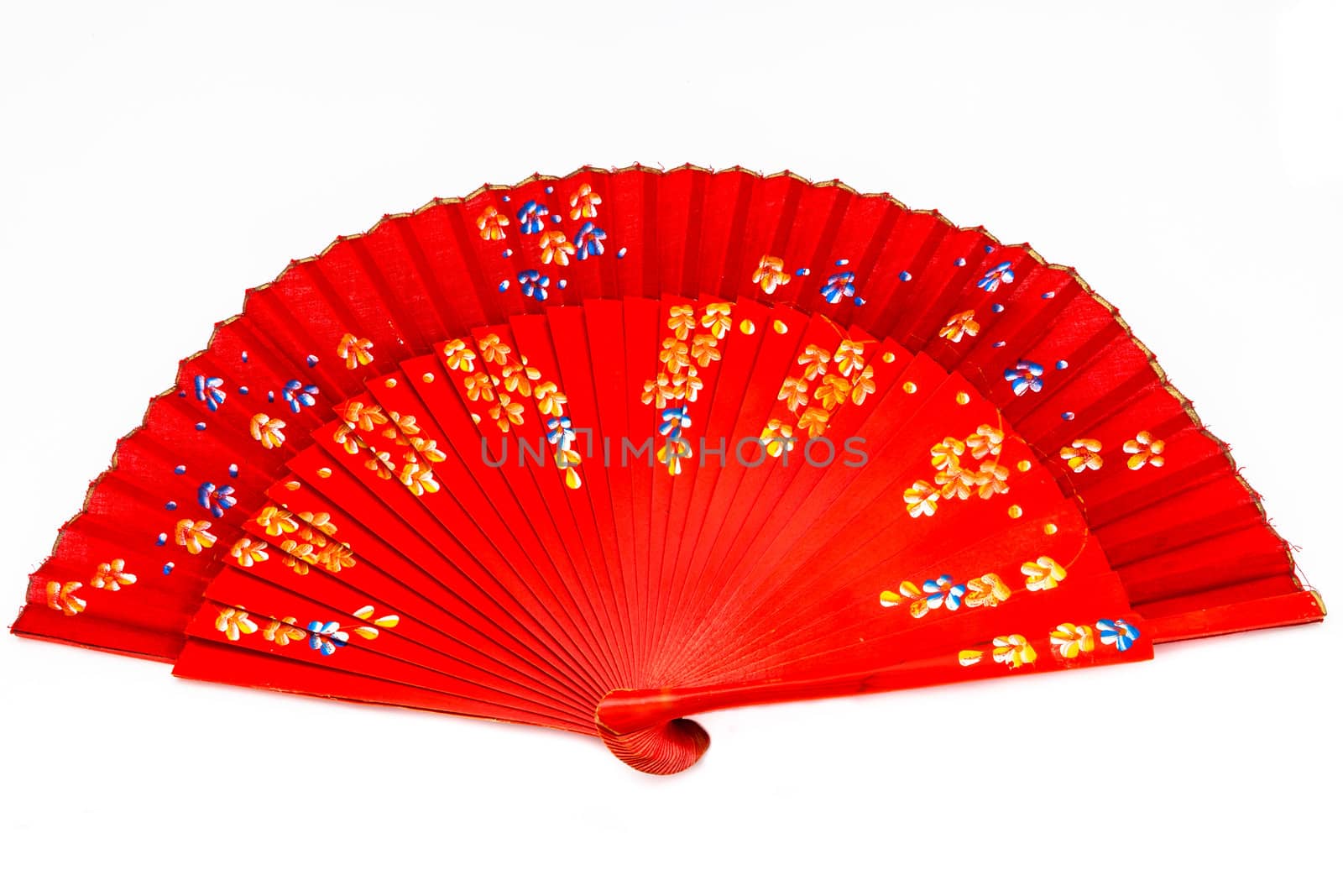 Red spanish fan on a white background