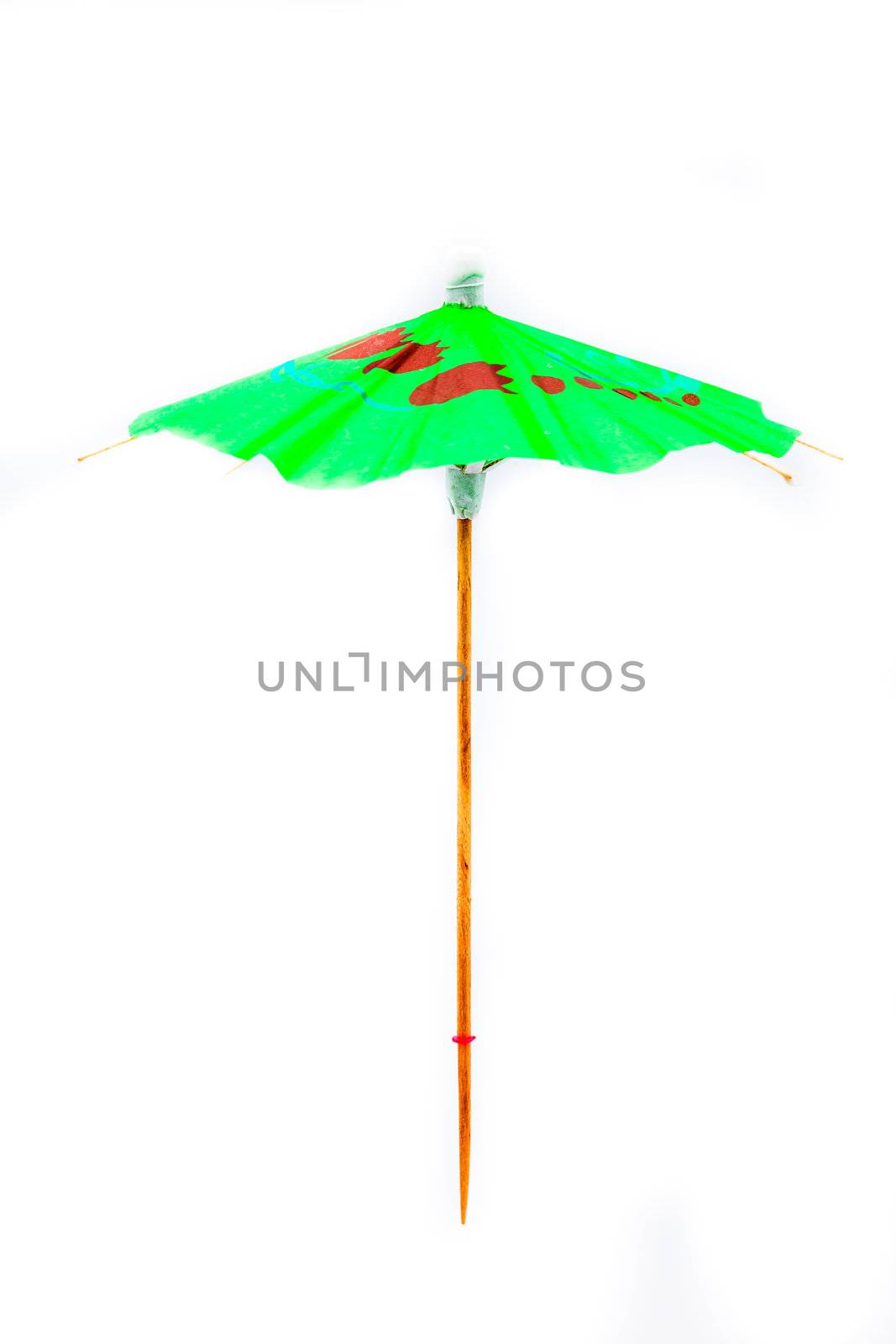 One cocktail umbrella on a white background