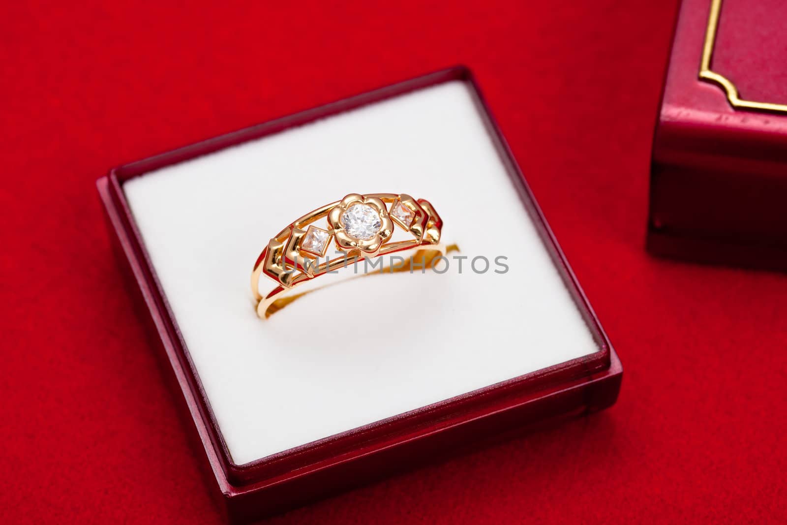 Fantastic gold ring adorned with several white zirconia