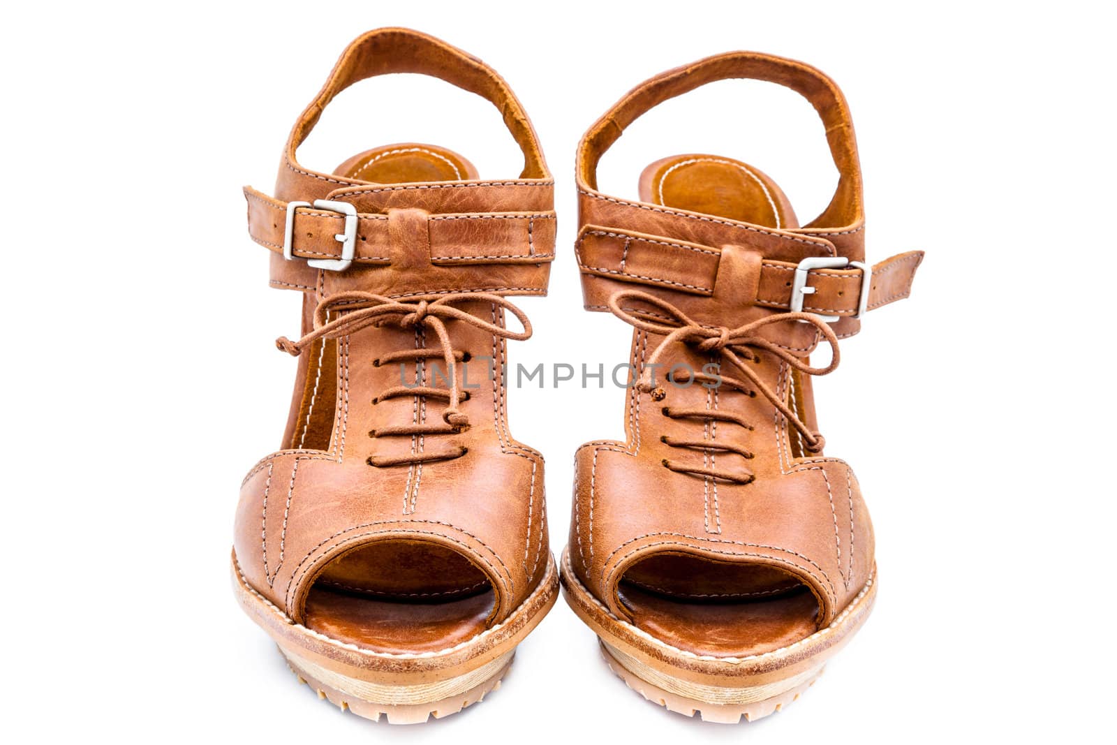Pair of leather dress women shoes isolated over white
