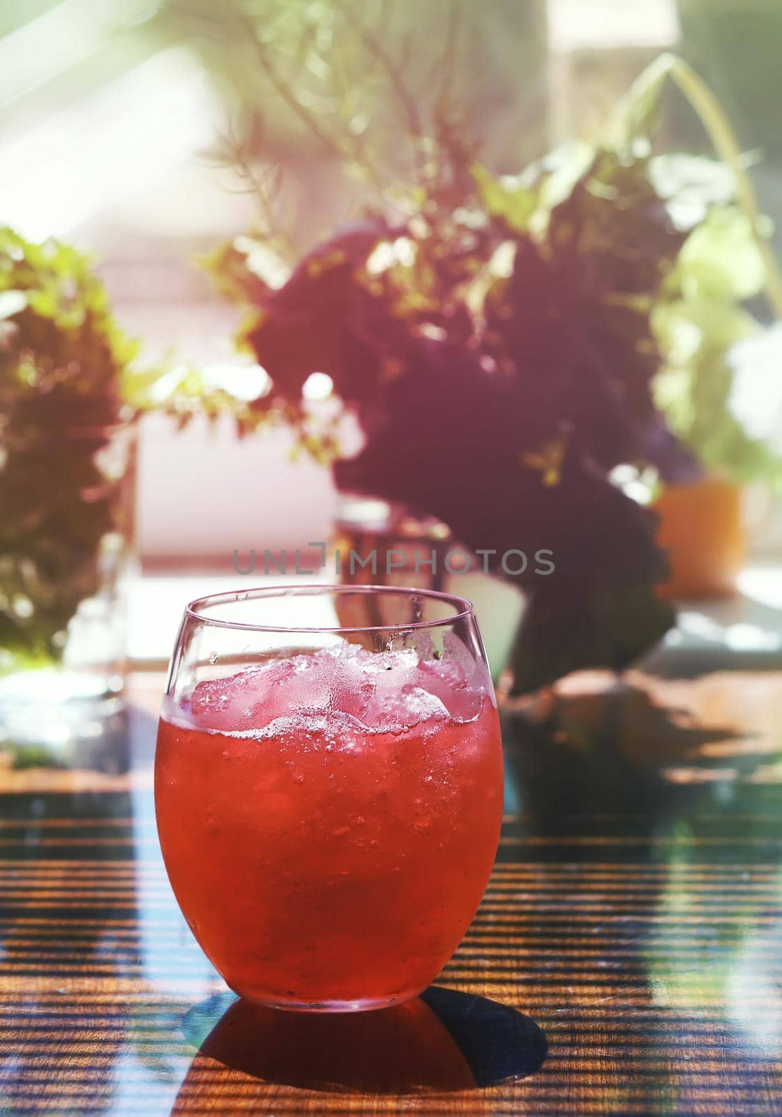 Fresh fruit cocktail in a glass on a table outdoors