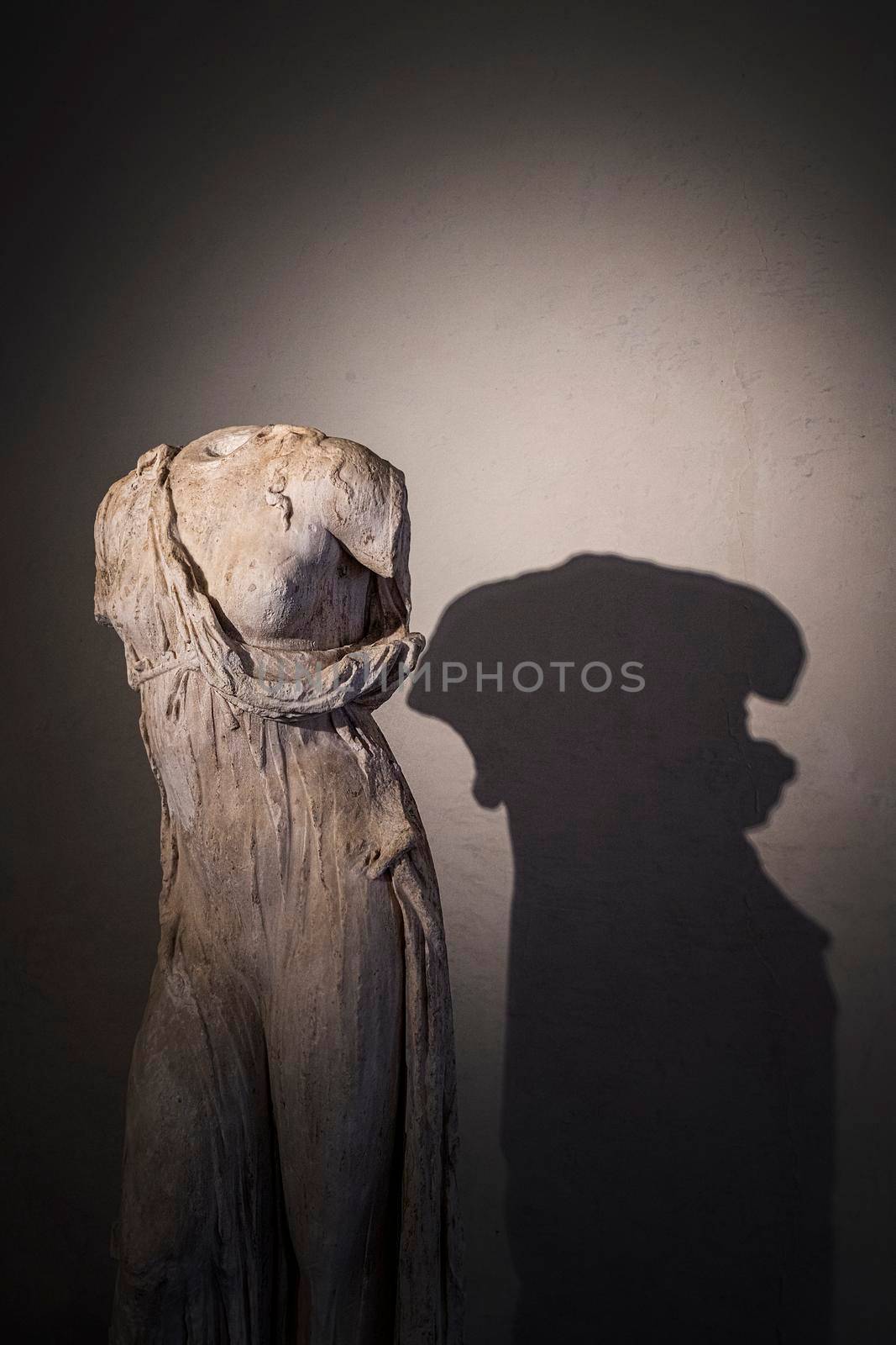 Mantua, Italy. July 13, 2021.  the shadow reflected on the wall by an ancient marble statue in the Te museum
