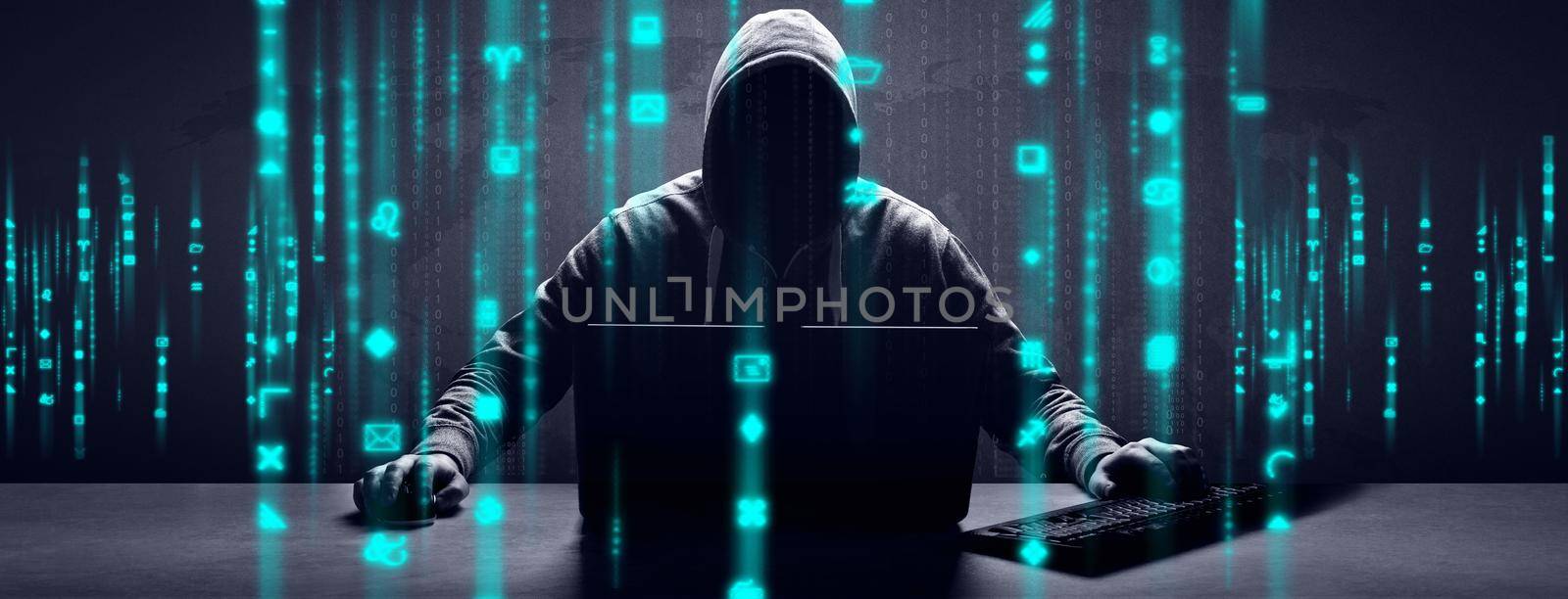 Anonymous internet hacker in front of computer. Web crime concept by Taut