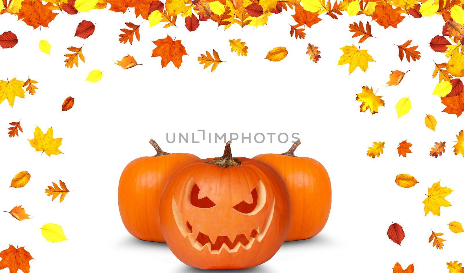 Close up view of scary Halloween pumpkin with eyes glowing inside by Taut