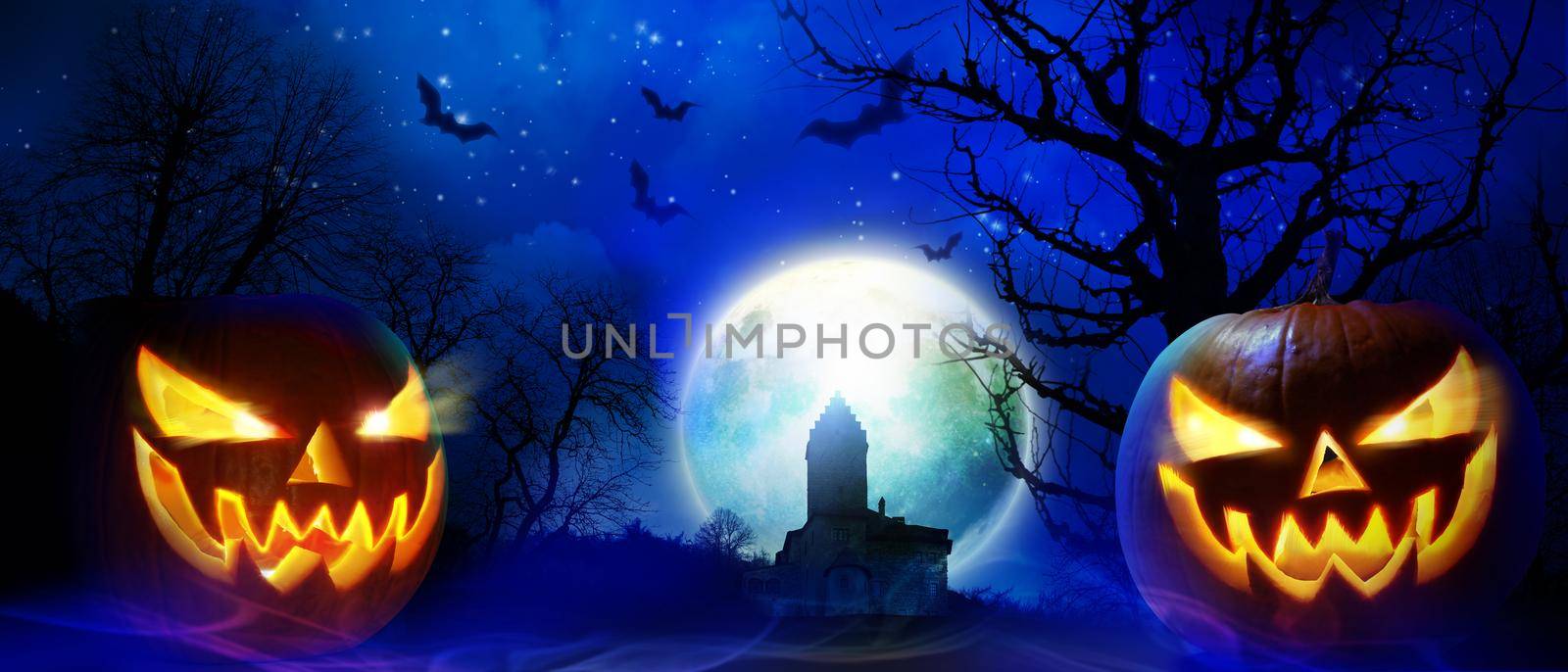 Halloween background with graveyard in a spooky night.