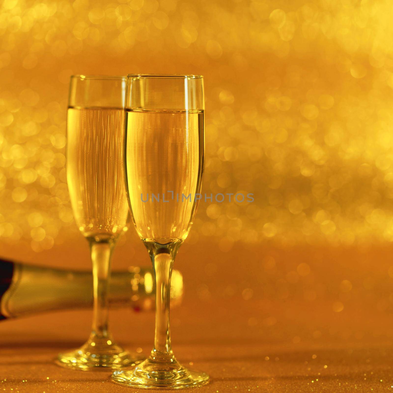 Glasses of champagne with splash, celebration theme concept