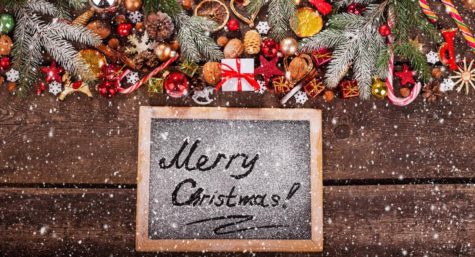Vintage wooden Blackboard. Merry Christmas holiday concept.